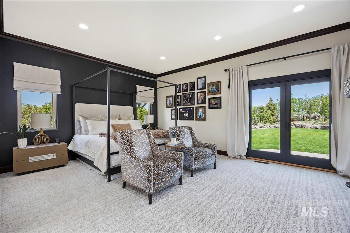 Bedroom with access to outside, recessed lighting, ornamental molding, and carpet floors