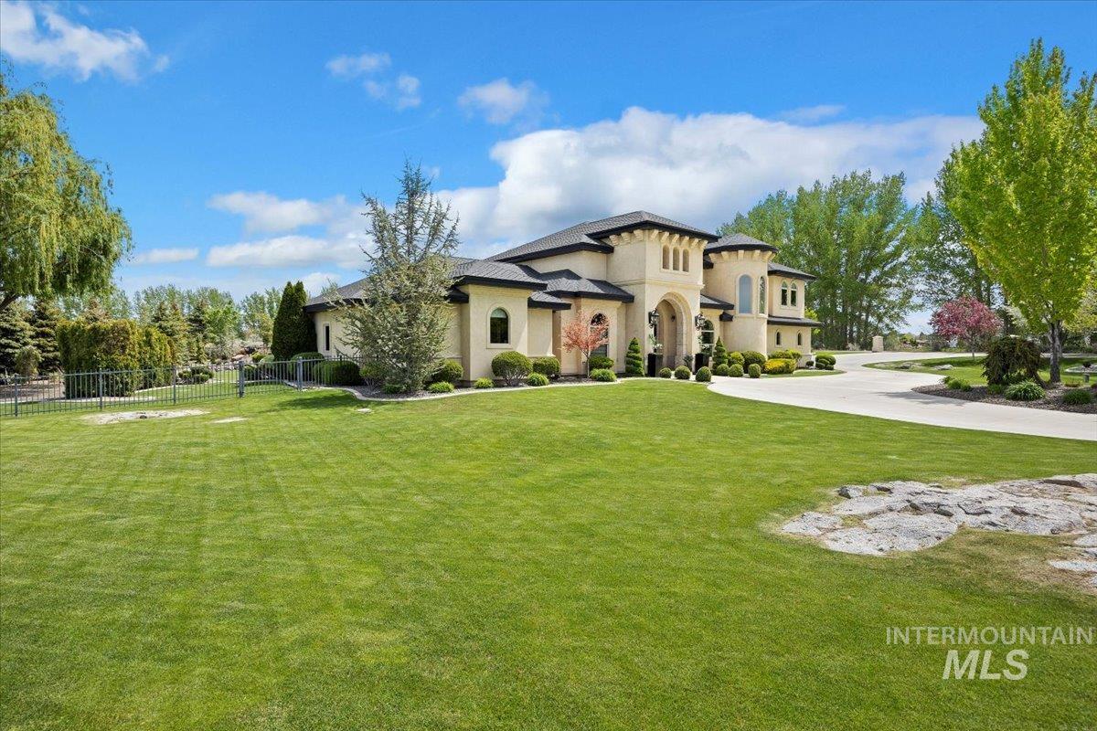 Mediterranean / spanish home with stucco siding