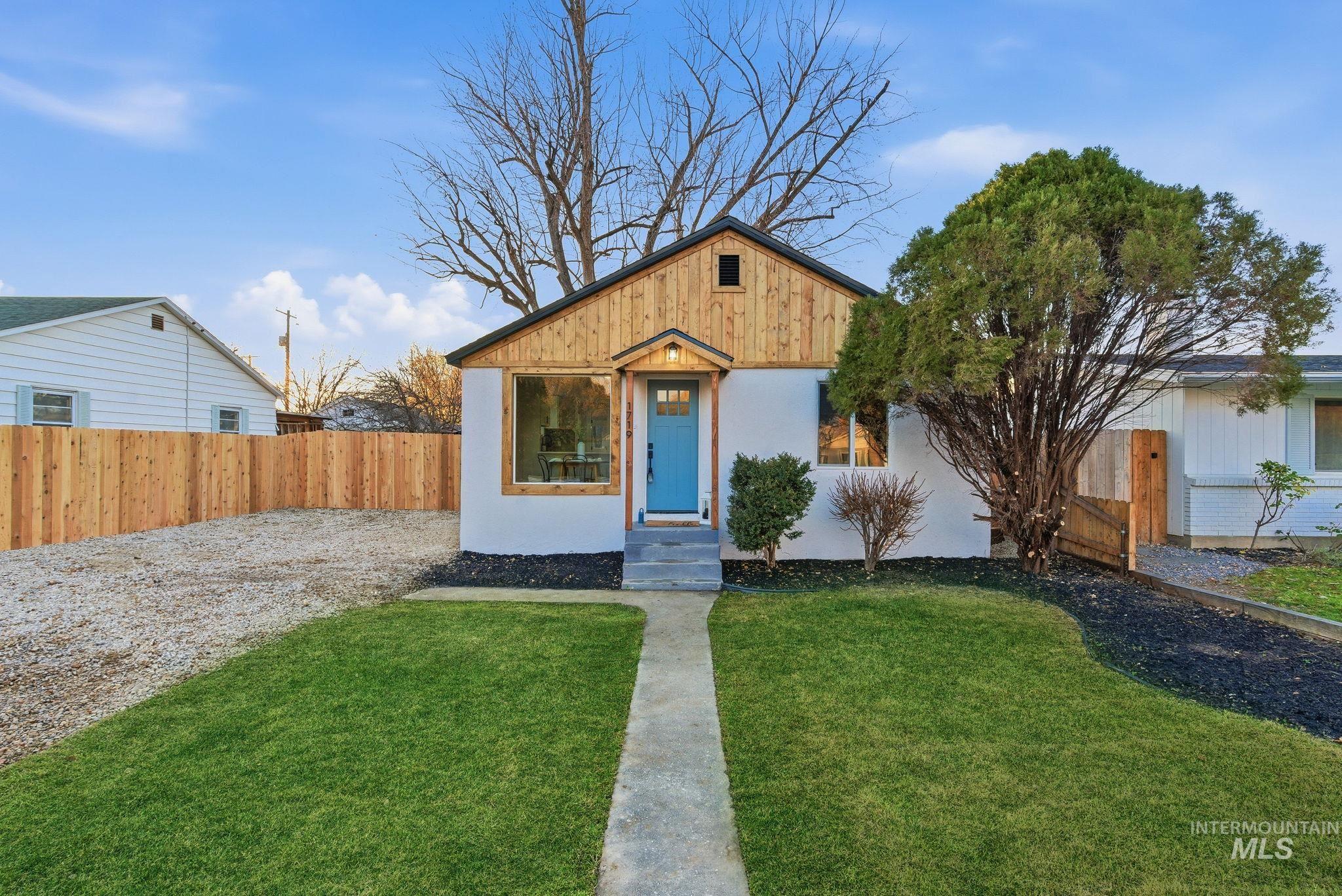 View of front facade with stucco siding