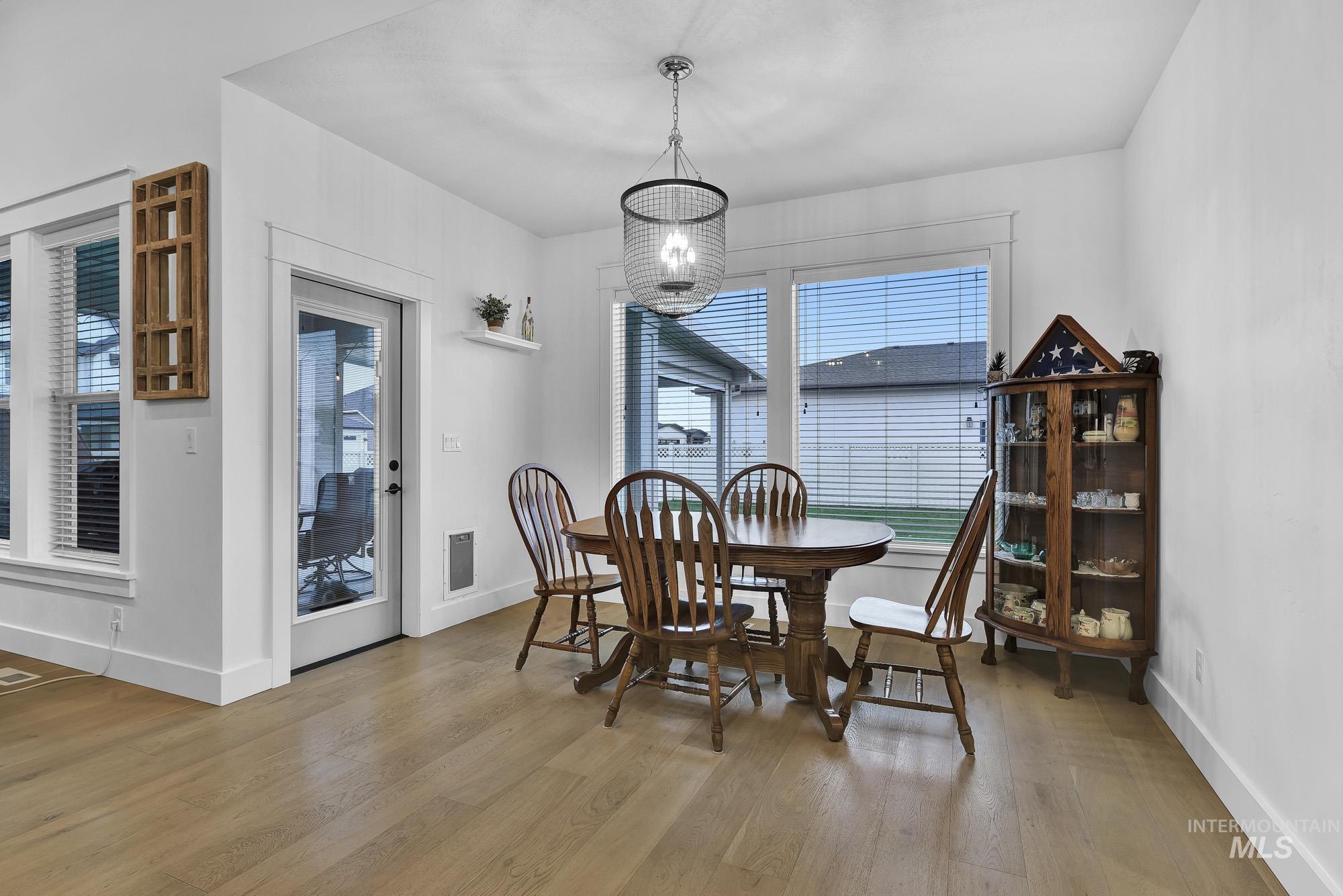 Dining area featuring light wood-type flooring