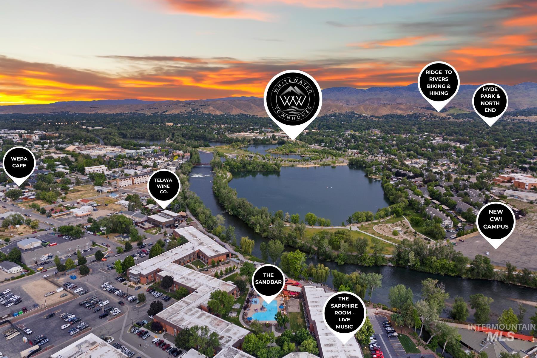 Aerial view at dusk of a water and mountain view
