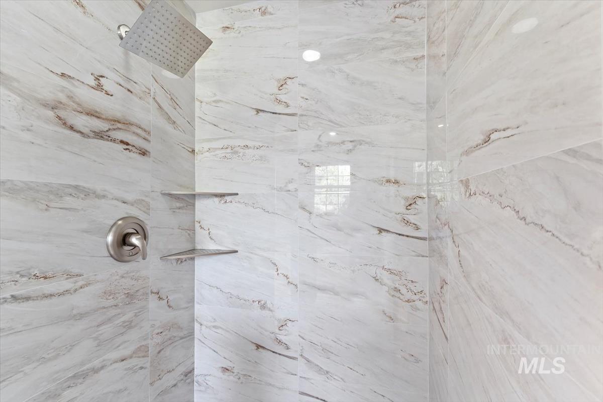 Detailed view of a marble finish shower