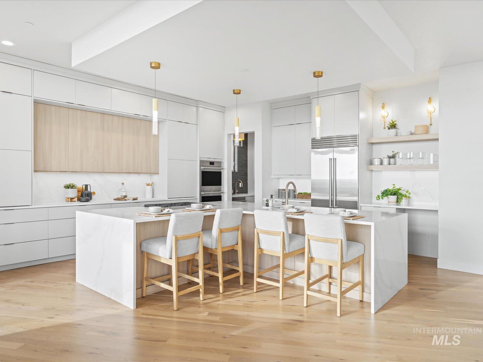 Kitchen featuring modern cabinets, a kitchen breakfast bar, open shelves, and light stone counters