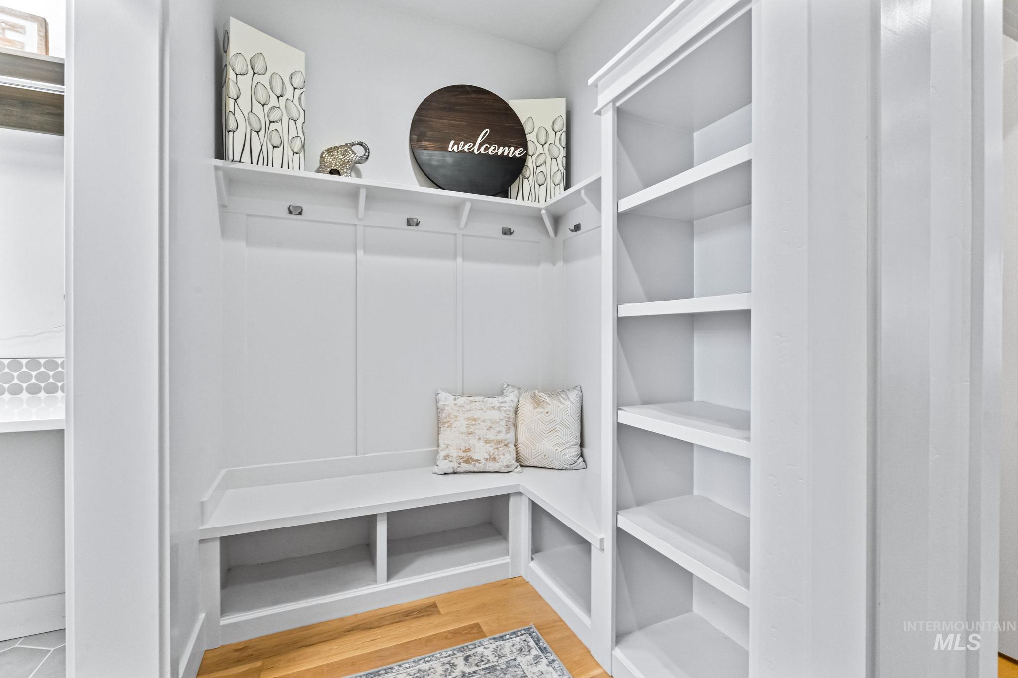 Mudroom featuring wood finished floors
