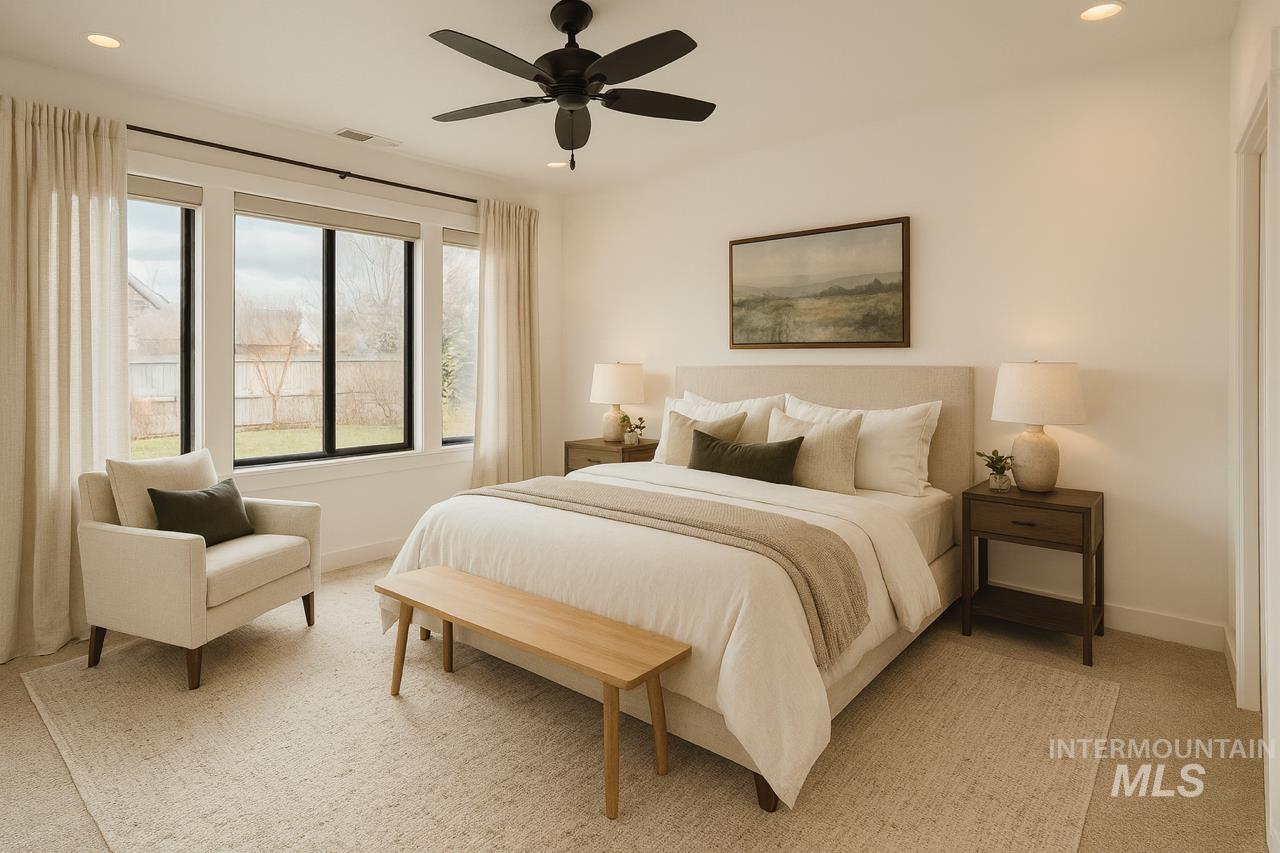 Bedroom with recessed lighting, a ceiling fan, and light carpet
