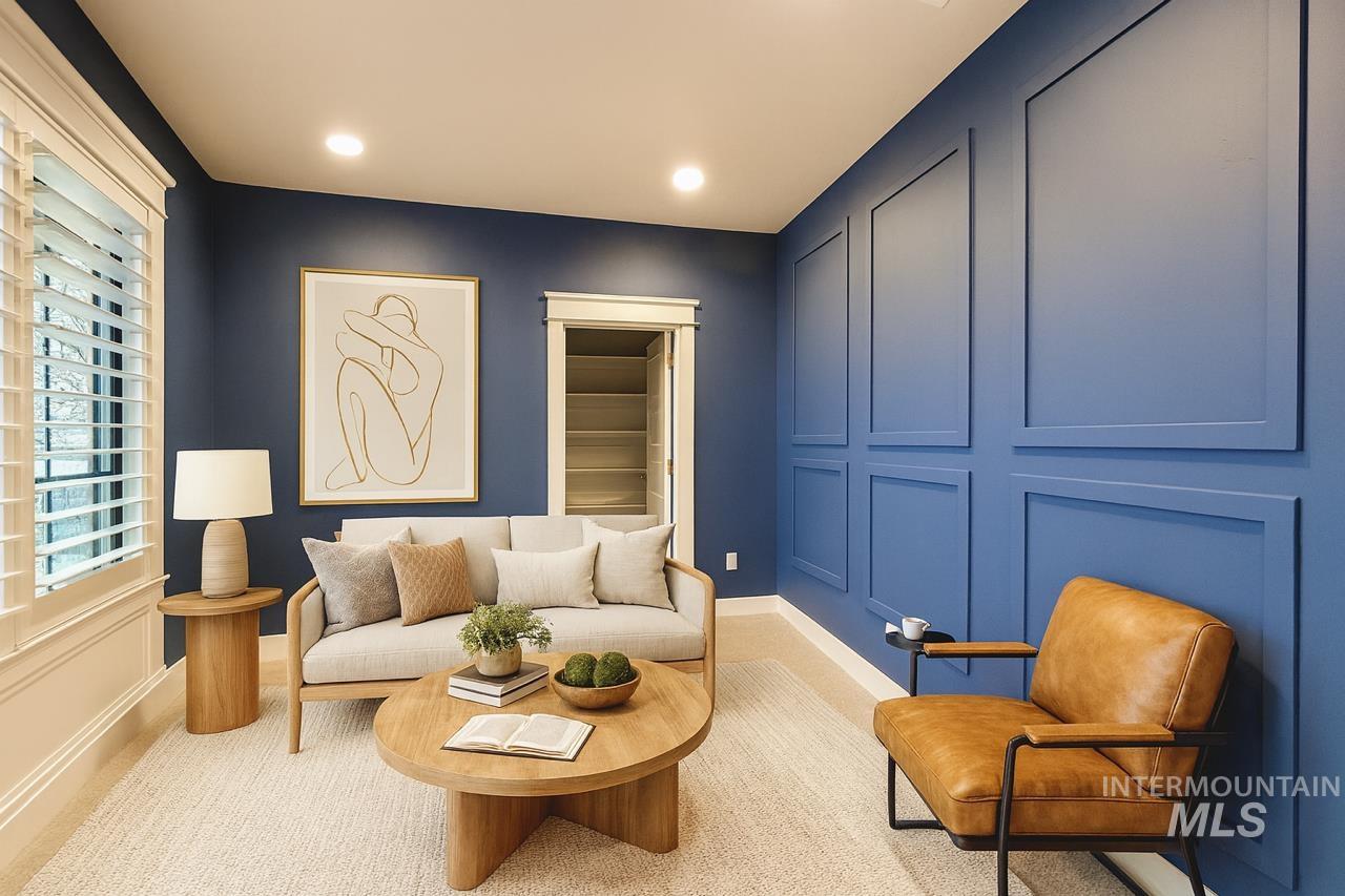 Living area featuring recessed lighting and carpet flooring