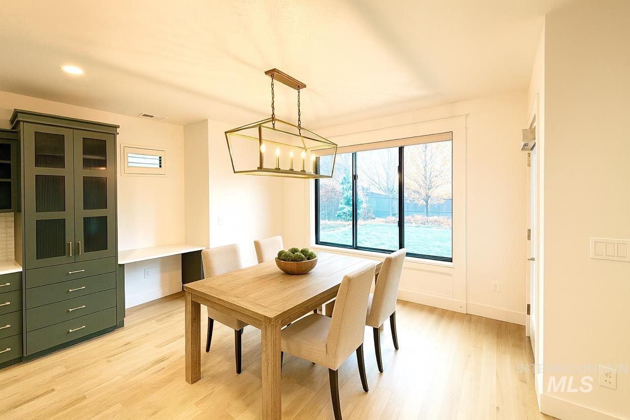 Dining room with light wood finished floors