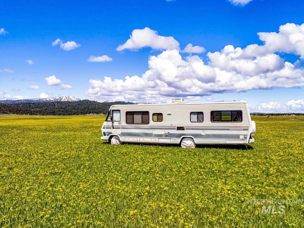 Exterior space featuring a yard