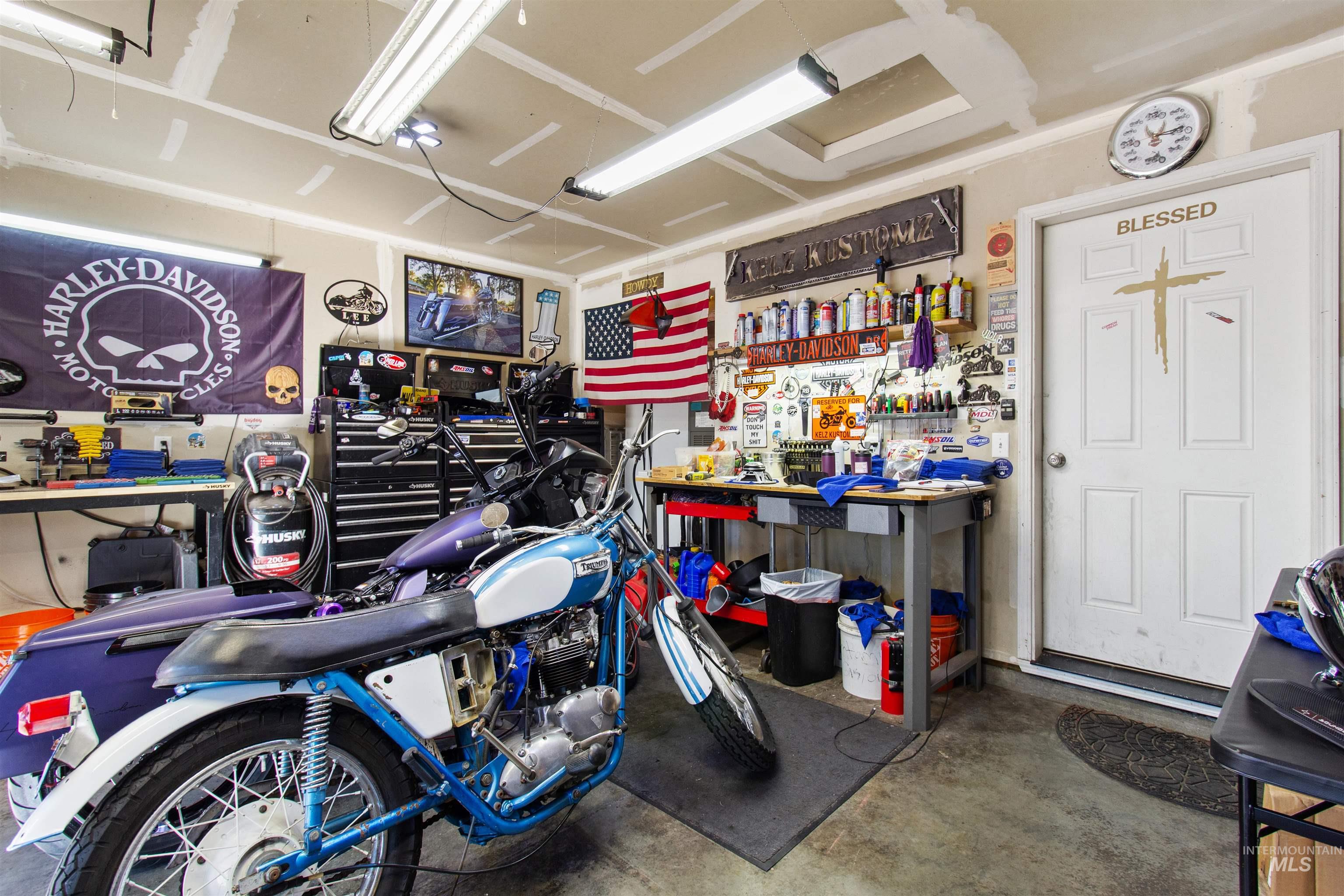 Garage featuring a workshop area