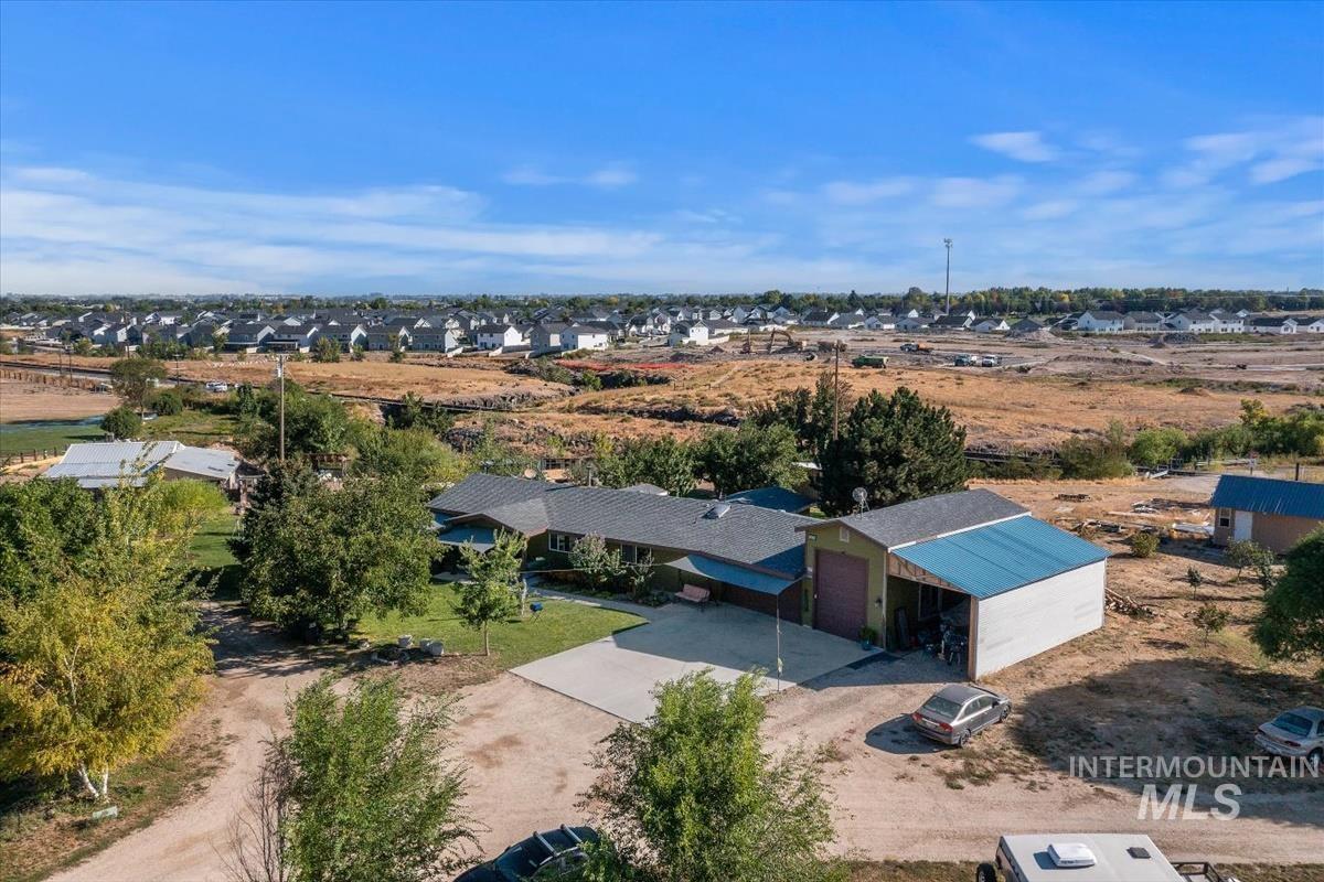 Aerial view of property and surrounding area