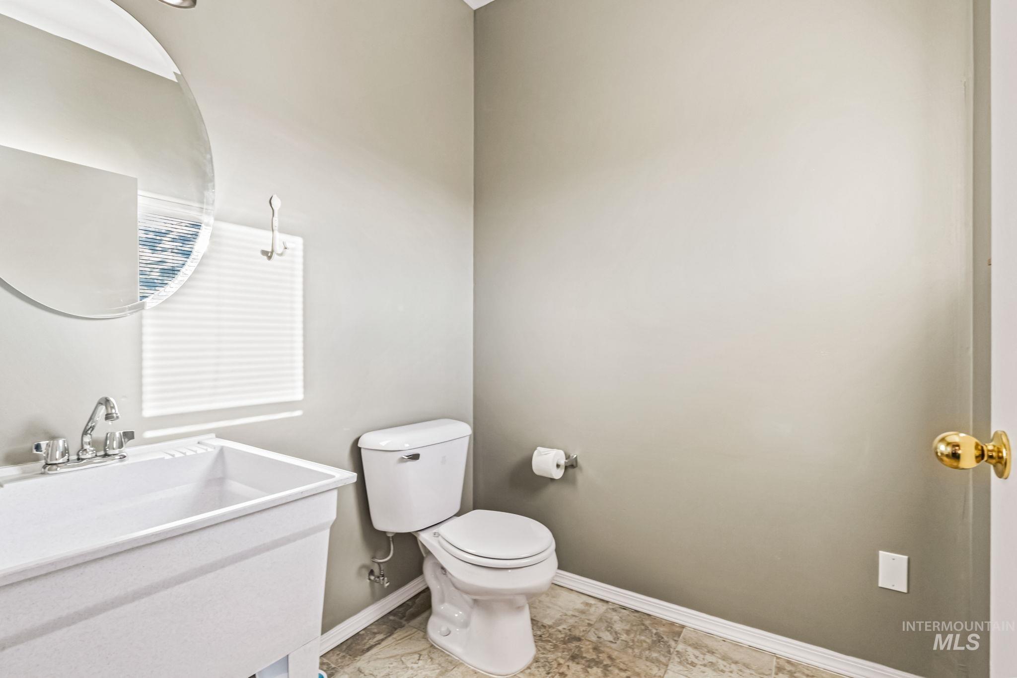 Bathroom with toilet and vanity