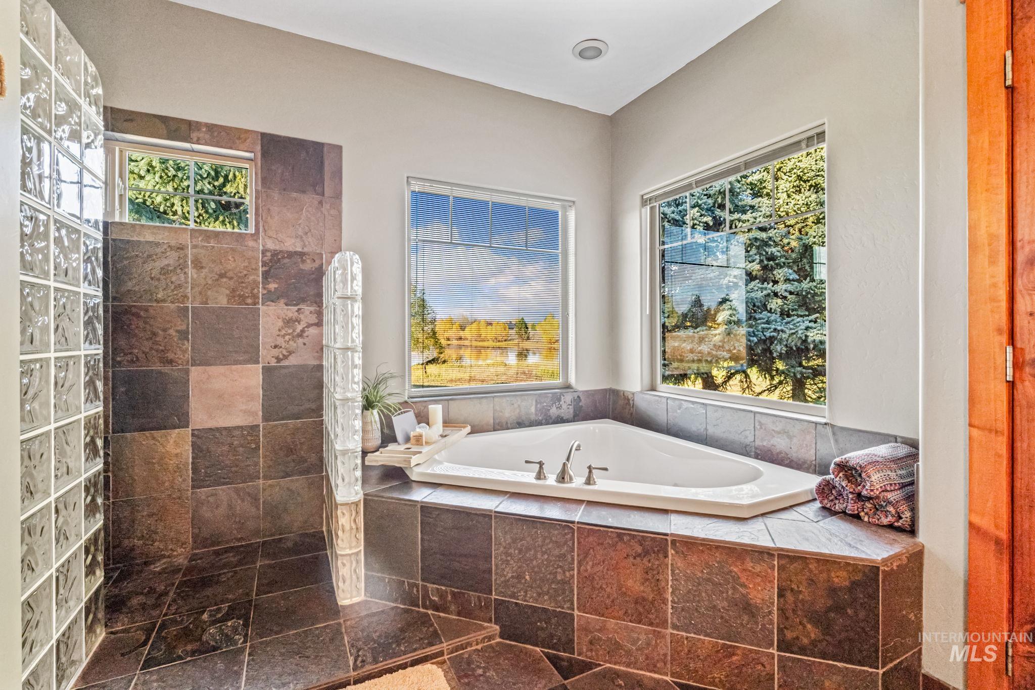 Bathroom with a bath and walk in shower