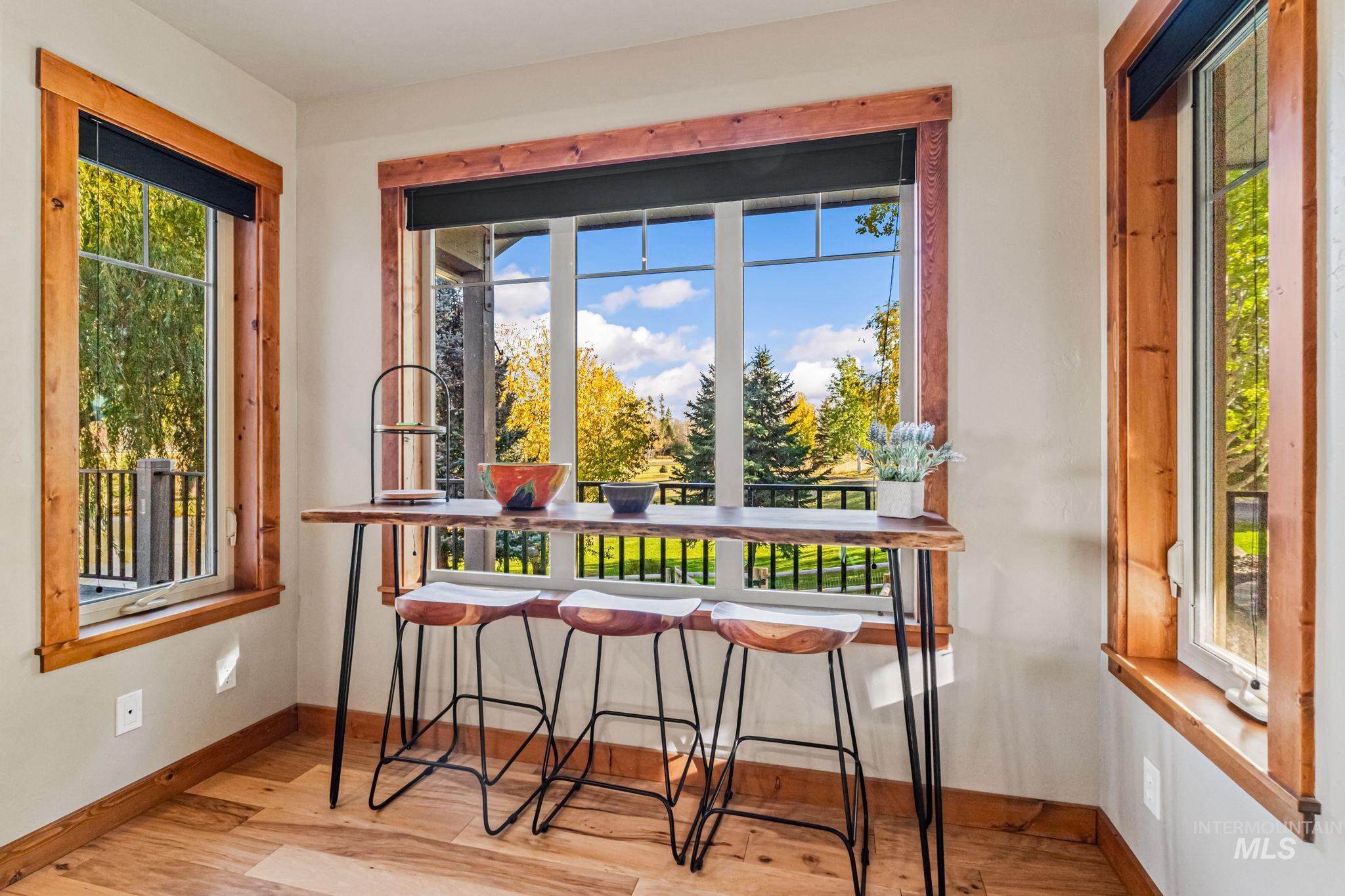 Dining room featuring baseboards and wood finished floors