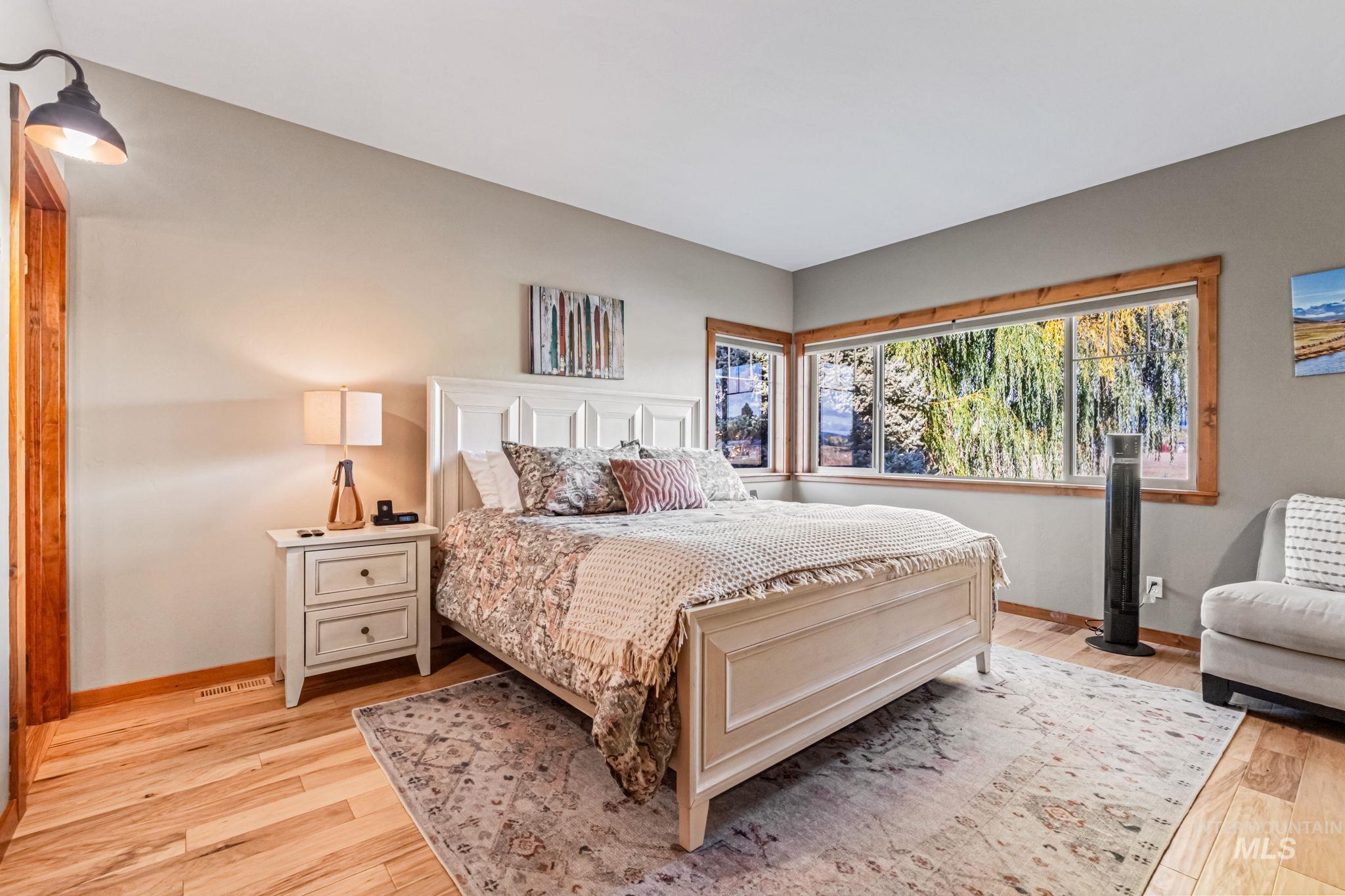 Bedroom with light wood finished floors