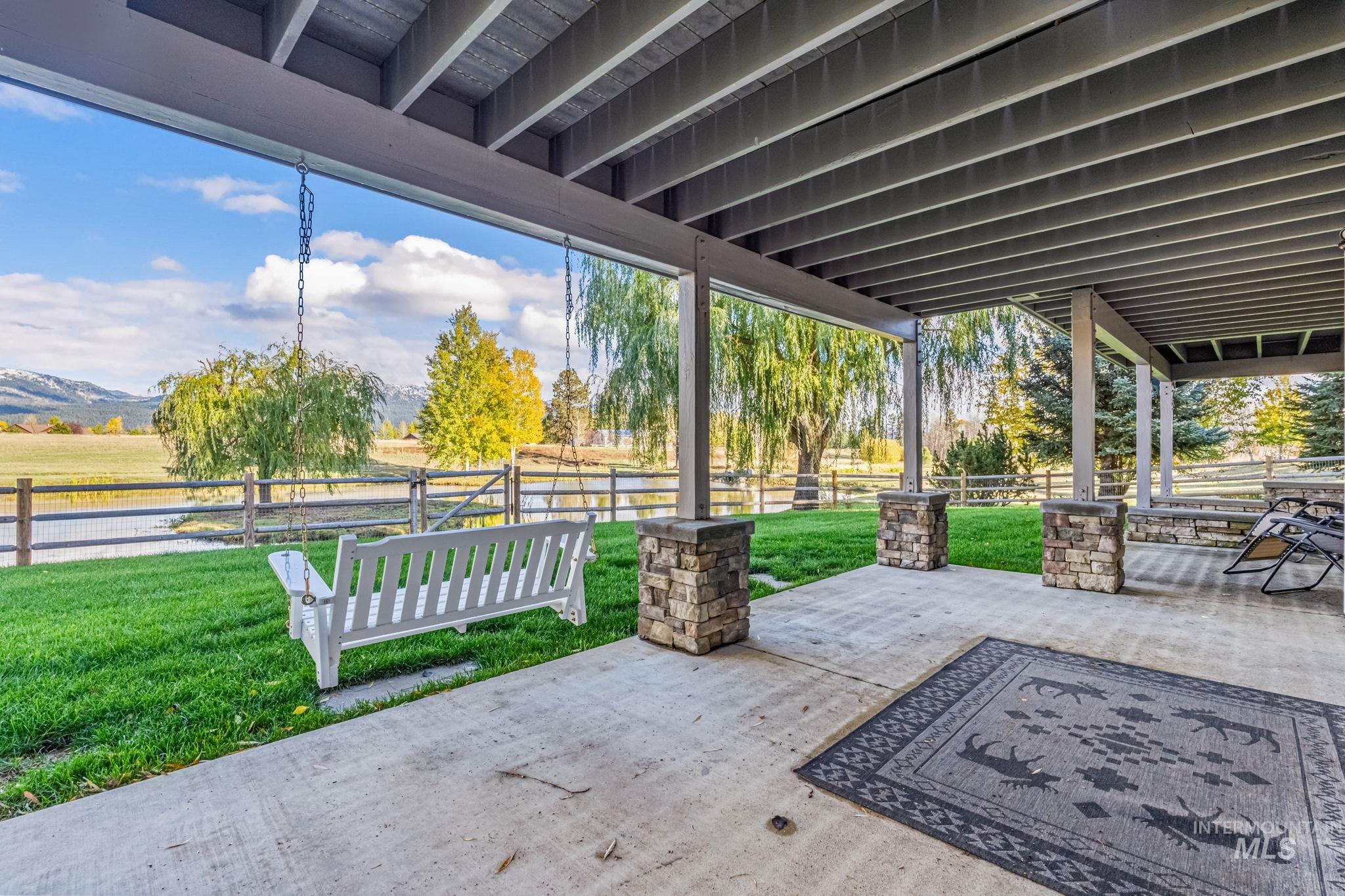 Fenced backyard with a patio