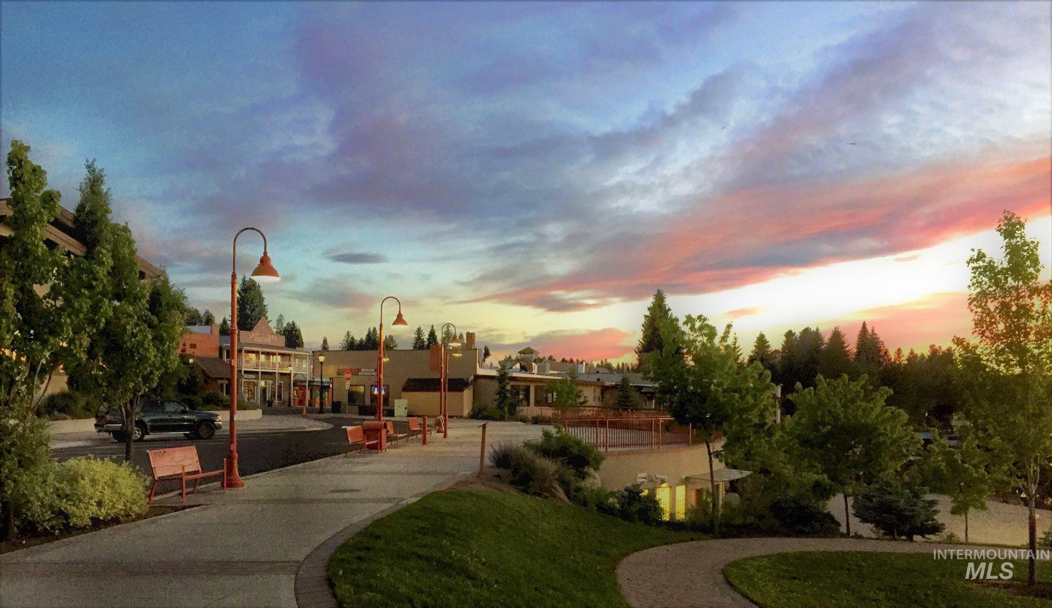 View of property's community with a yard