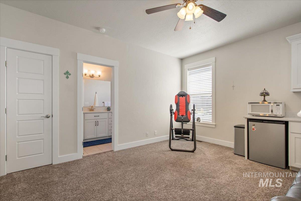 Multi-gen suite with a mini kitchen and a separate entrance.