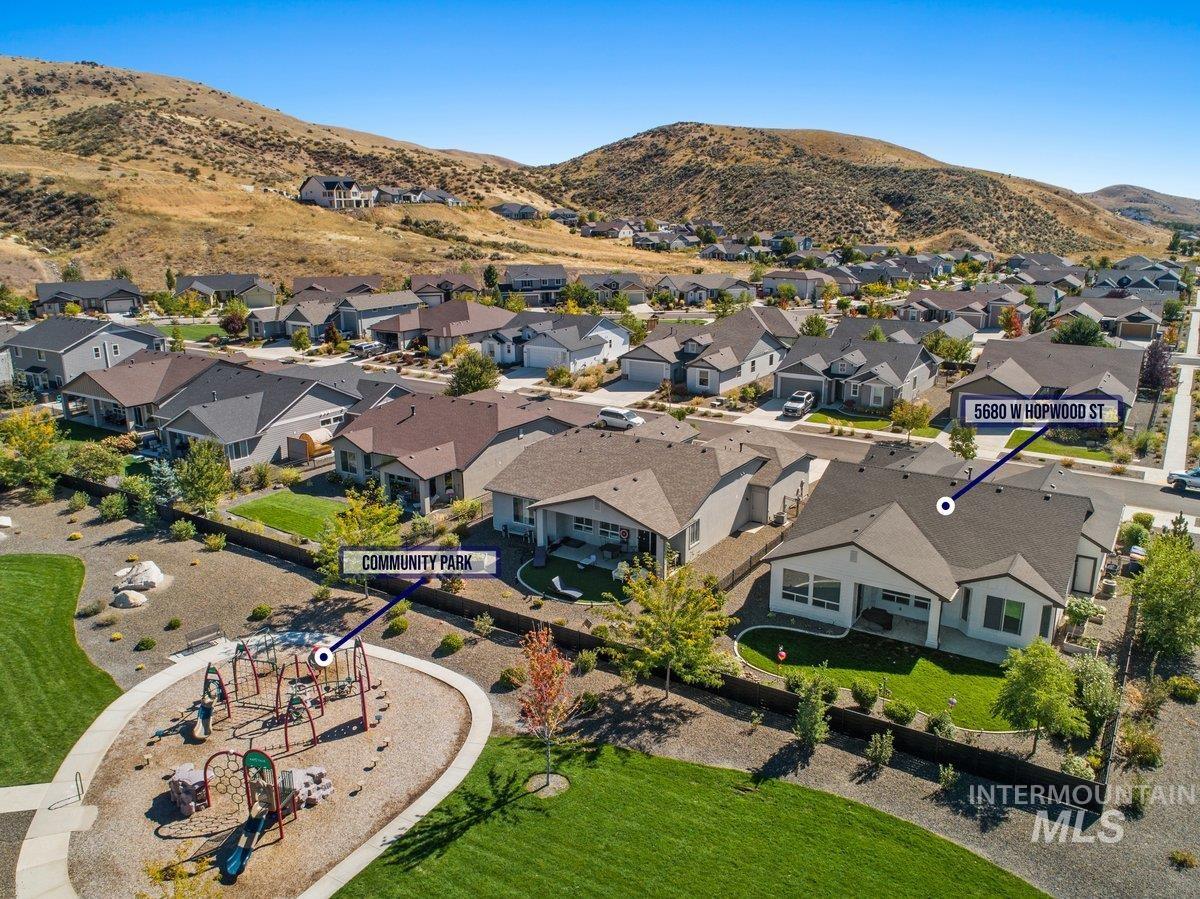 Outdoor pool and park right behind the house.