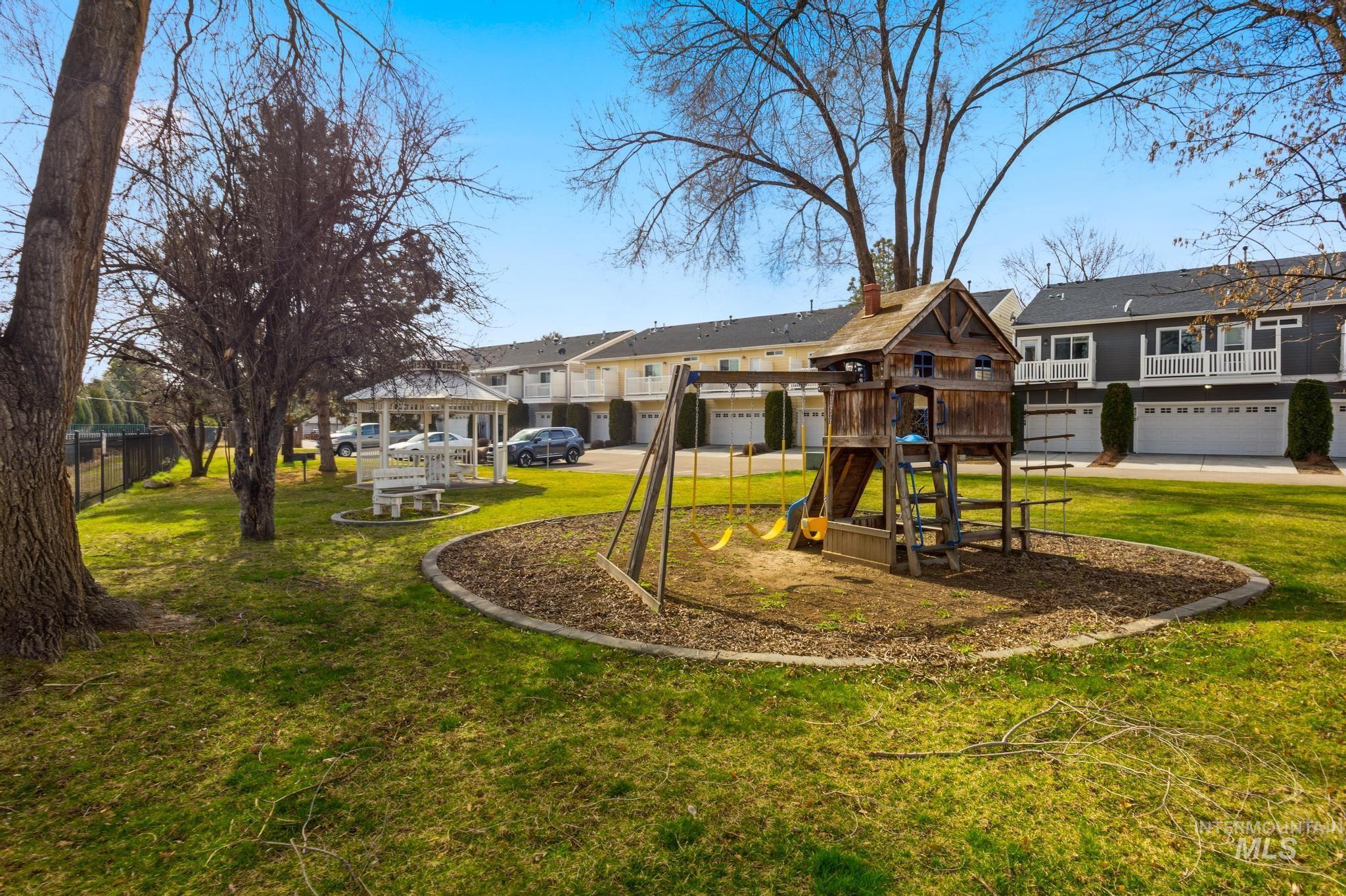 View of play area featuring a gazebo and a residential view