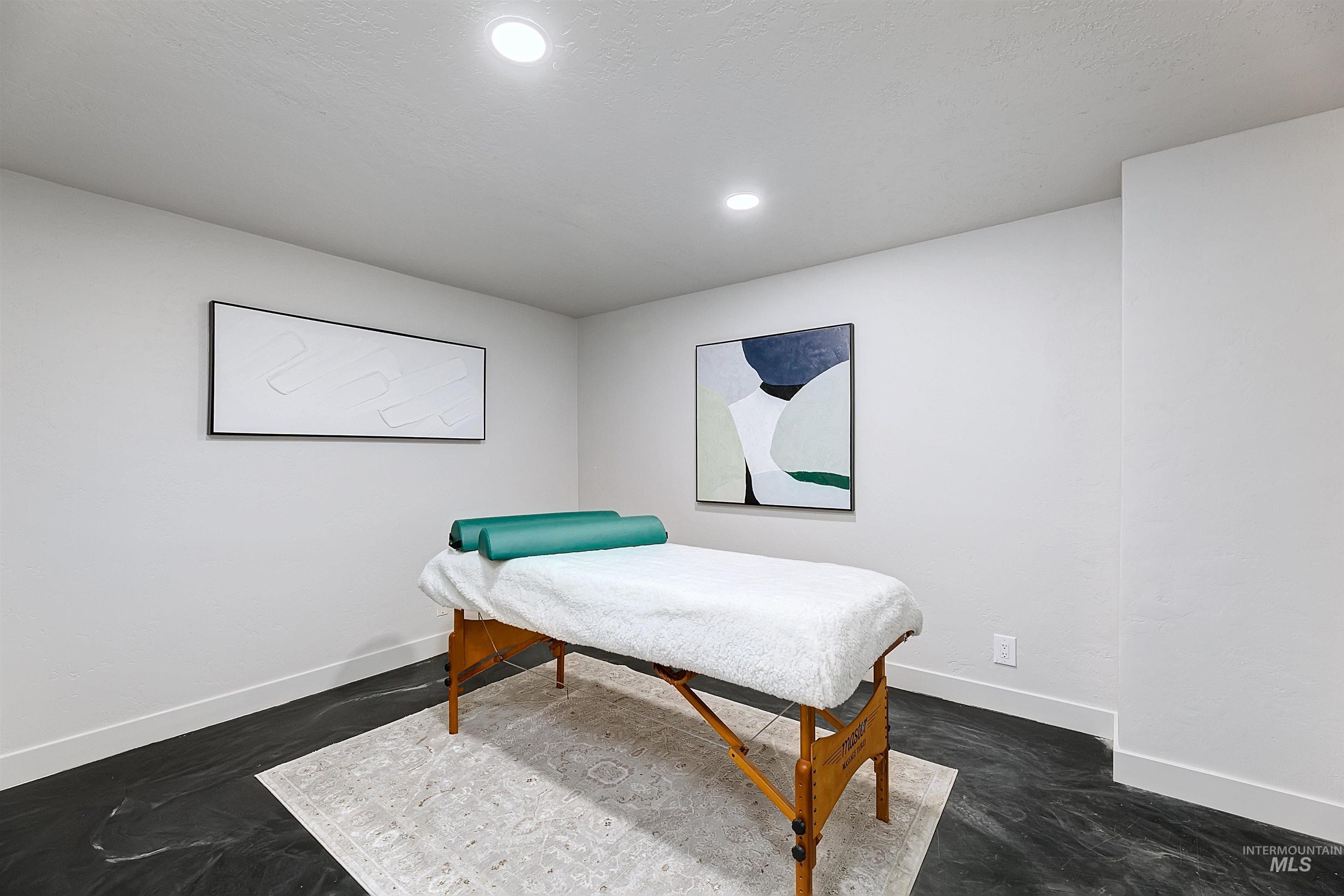 Bedroom with recessed lighting.