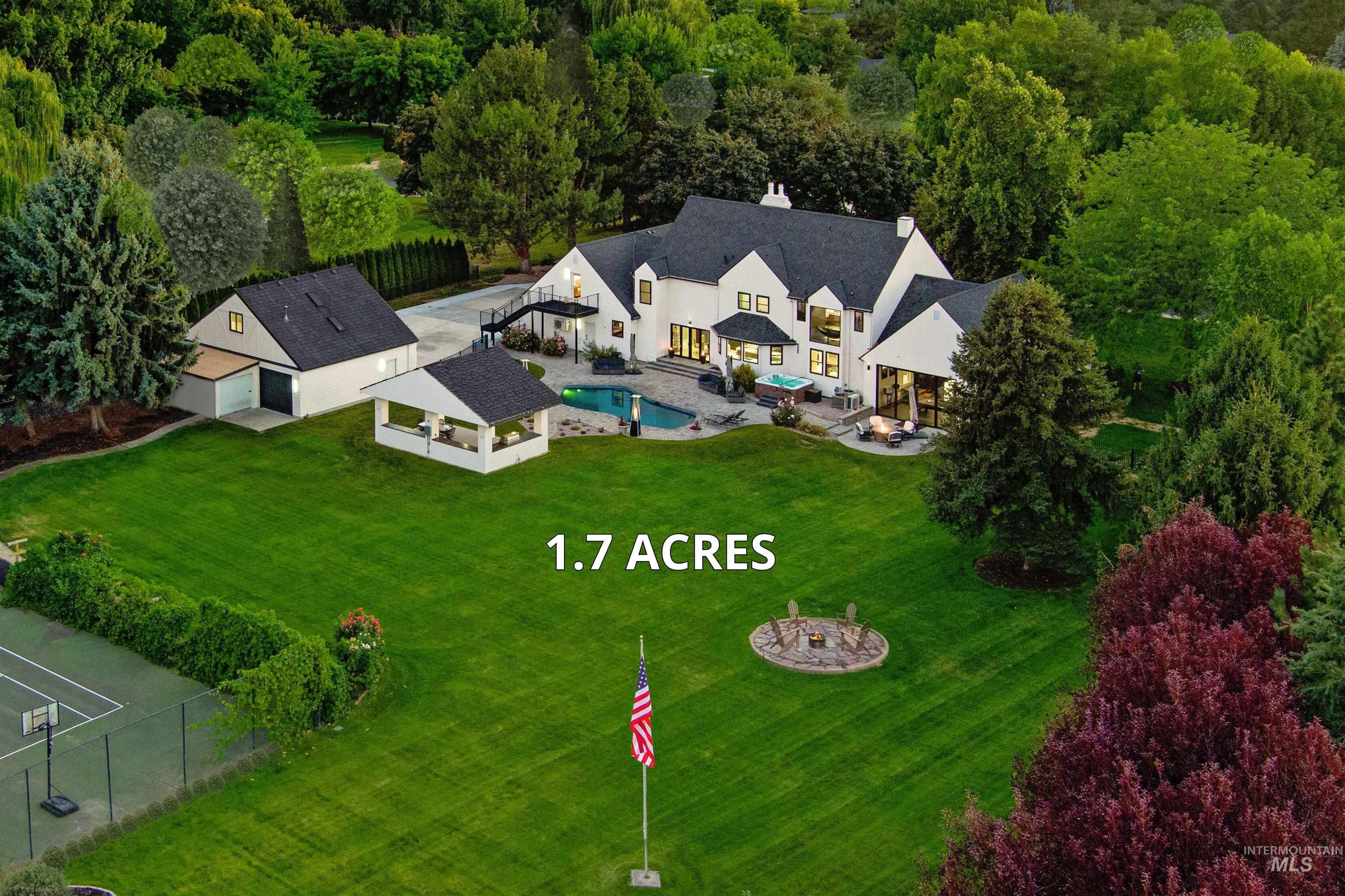View from above of property featuring a pool area