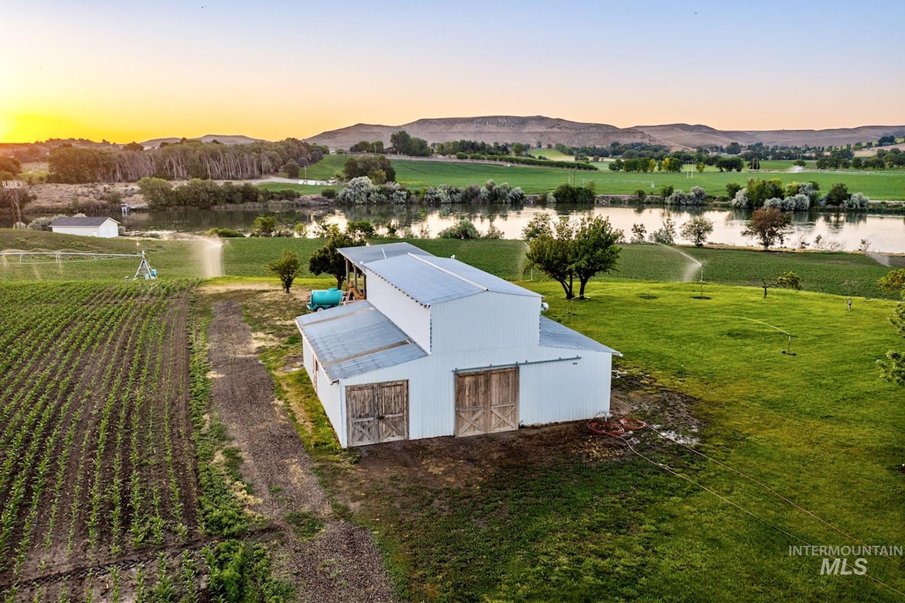 View of rural area with a water and mountain view