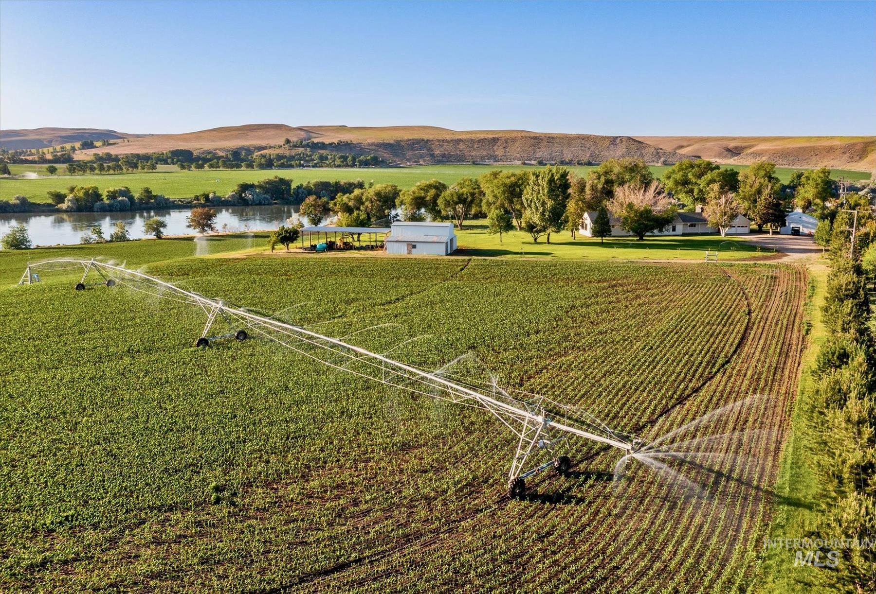 Overview of rural landscape with a water and mountain view