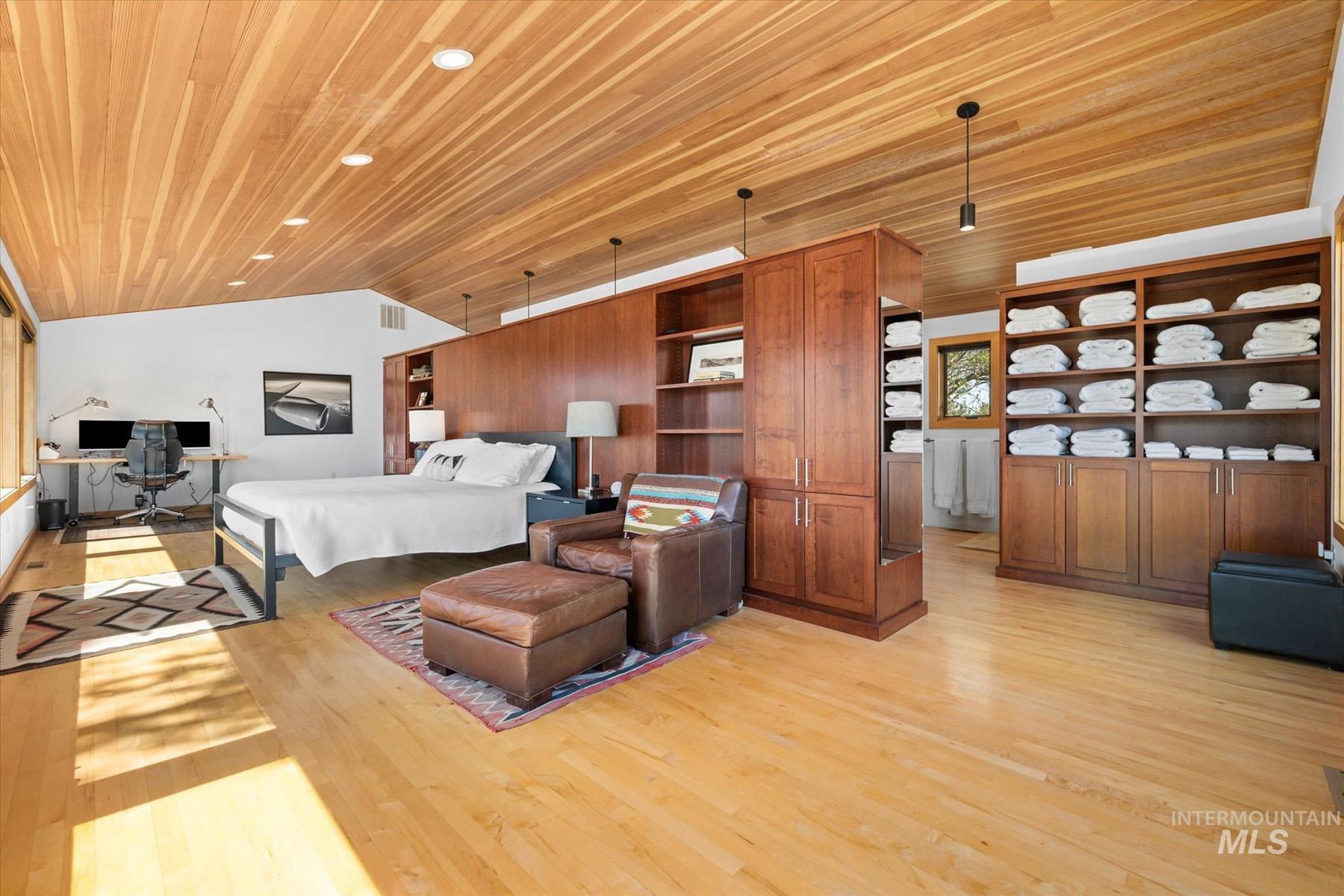 Bedroom with wood ceiling, vaulted ceiling, light wood-style flooring, a desk, and recessed lighting