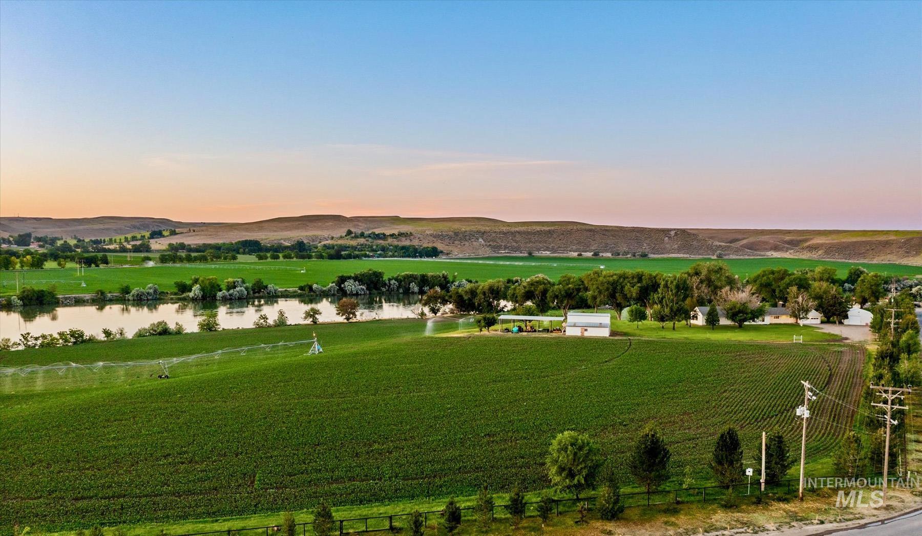 Overview of rural landscape with a water and mountain view