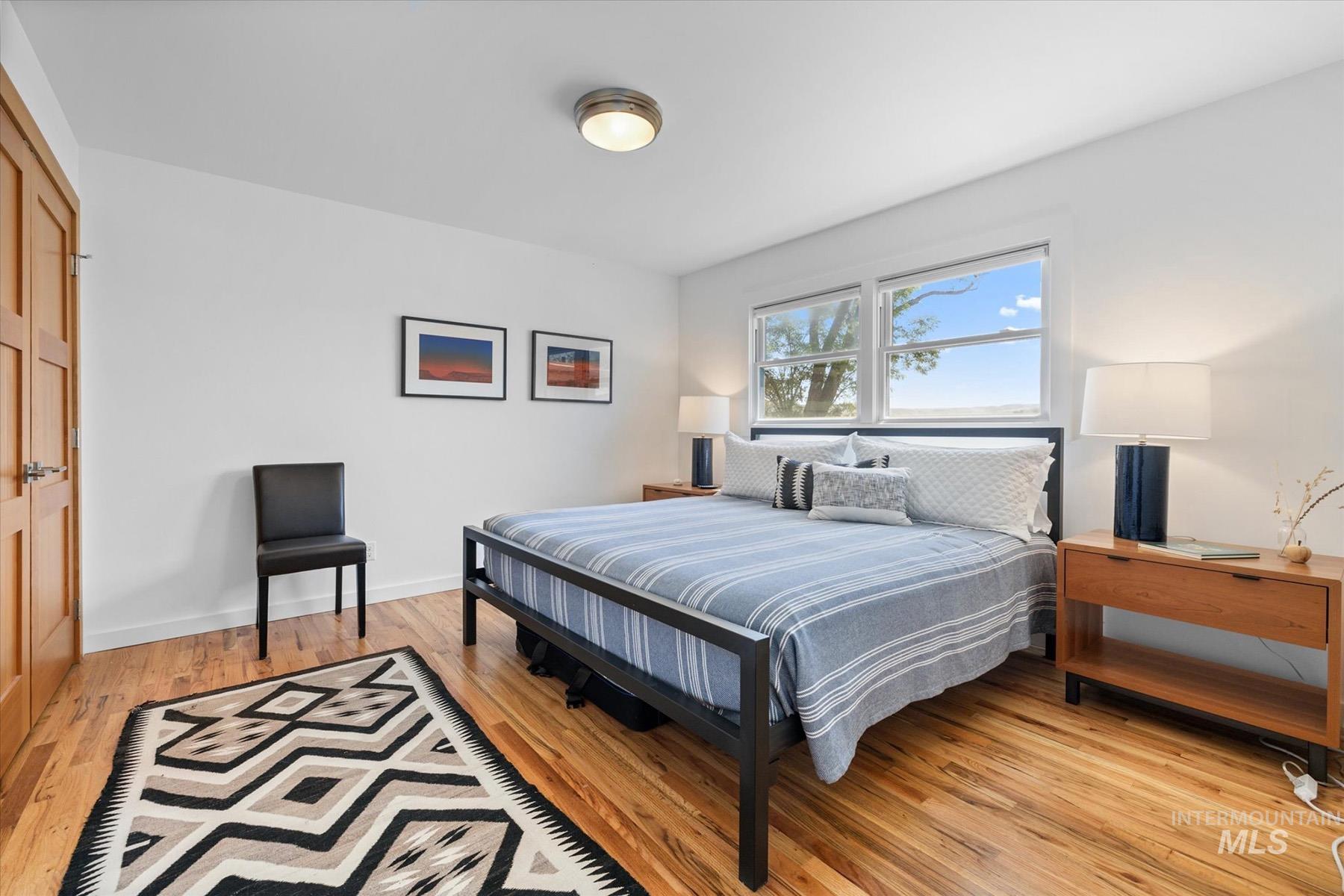 Bedroom with light wood finished floors