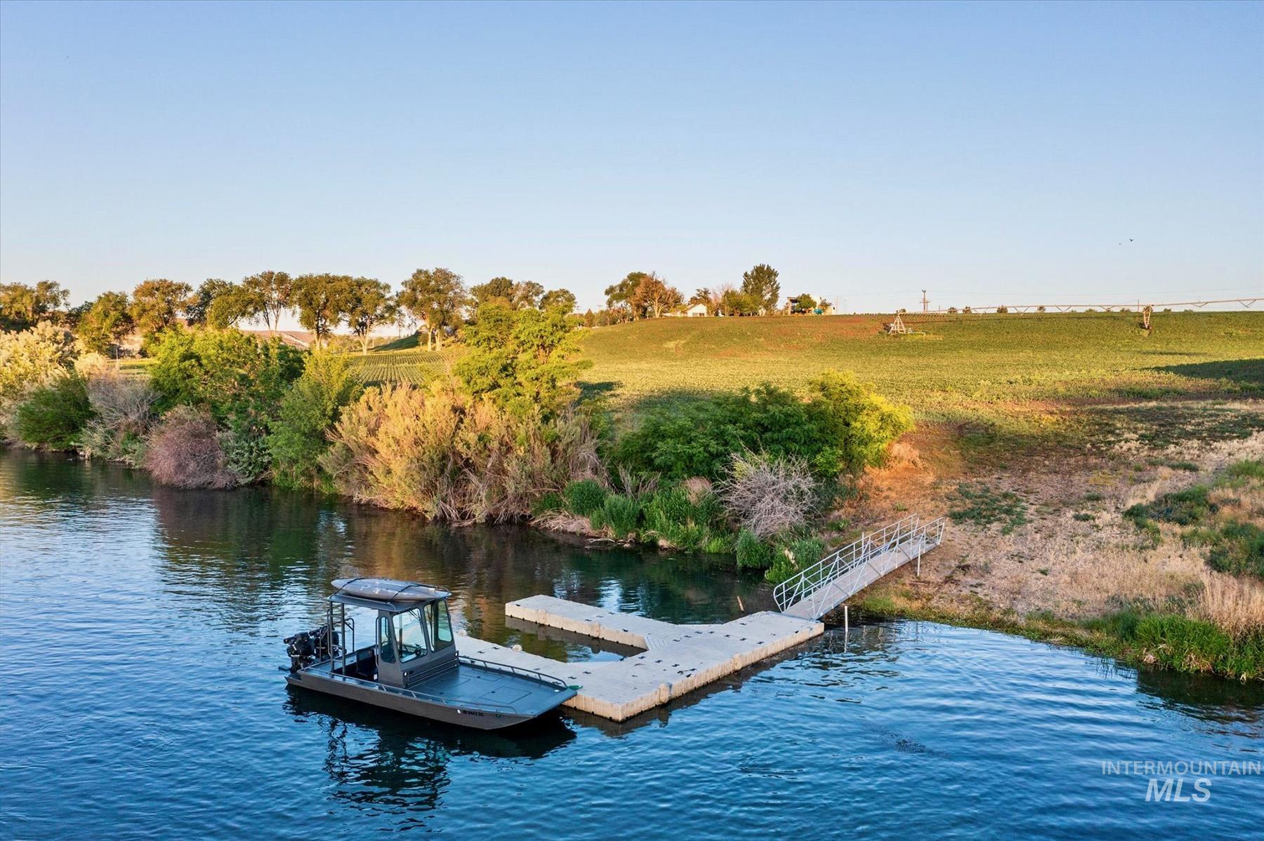 Dock featuring a water view