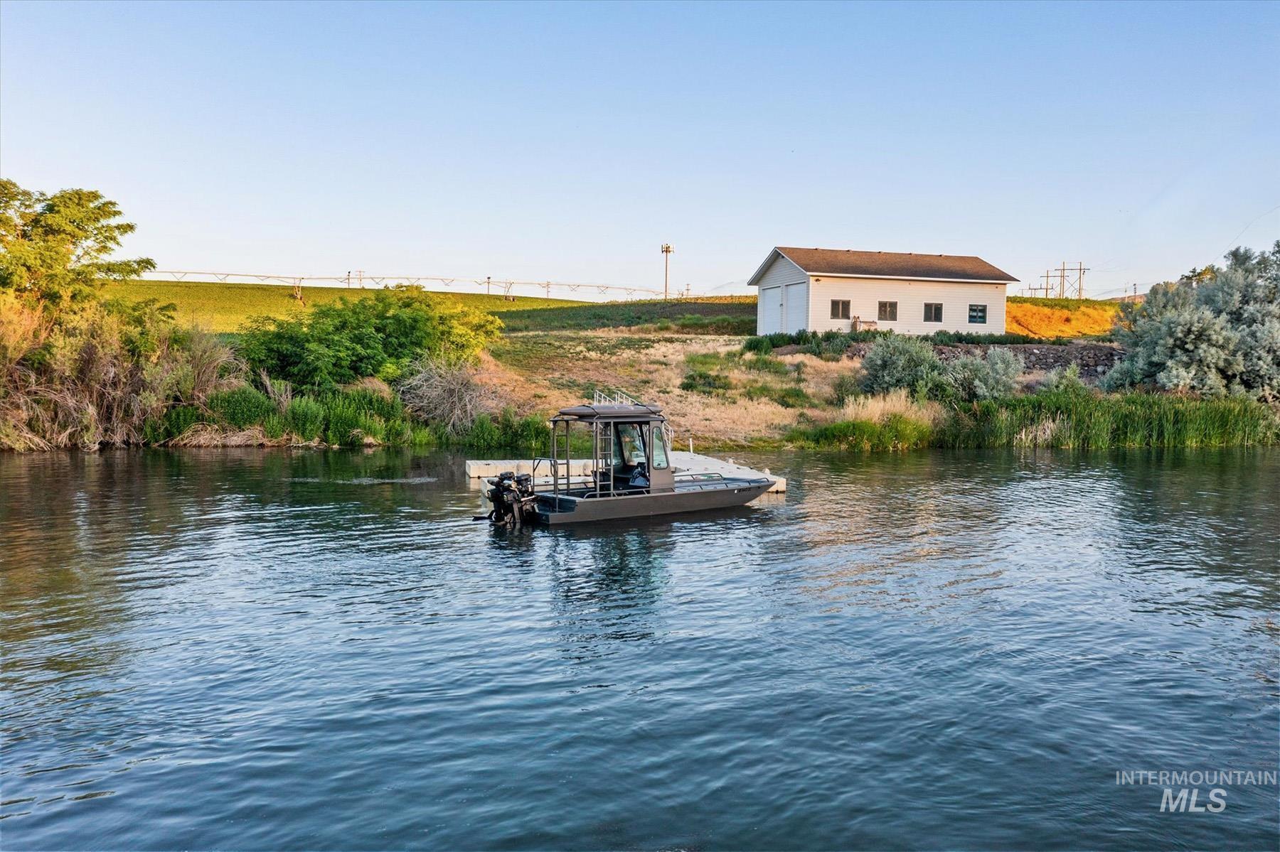 Water view with a floating dock