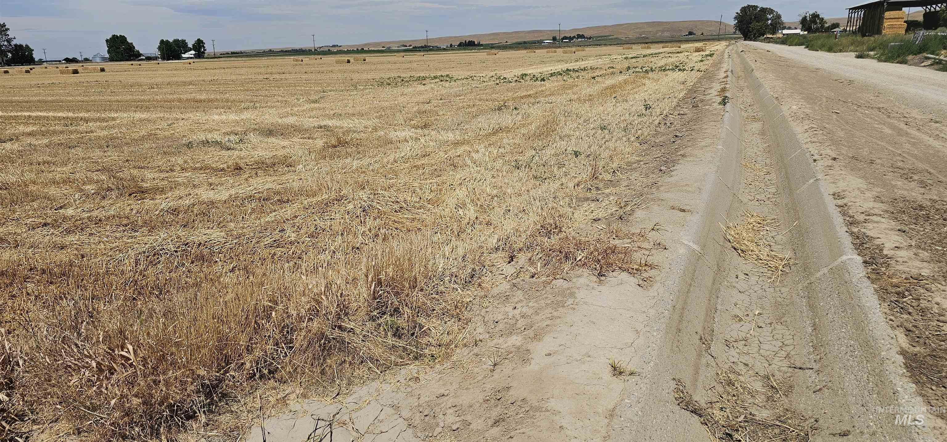 View of asphalt street with a view of countryside