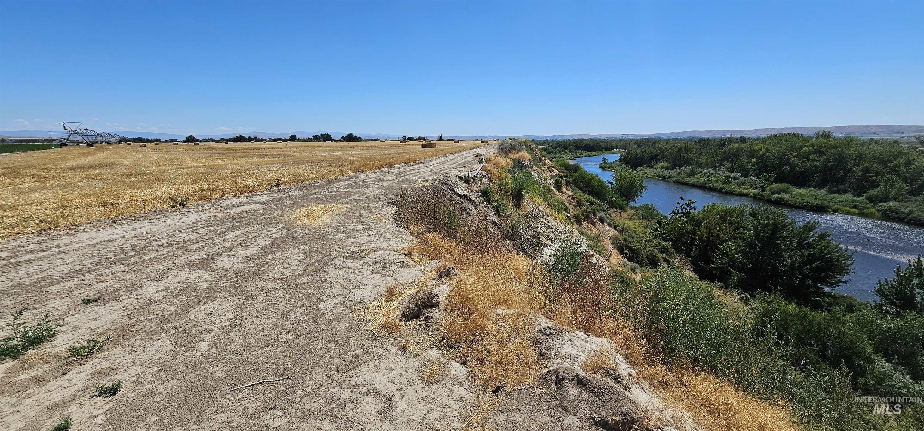 View of street with a water view and a rural view