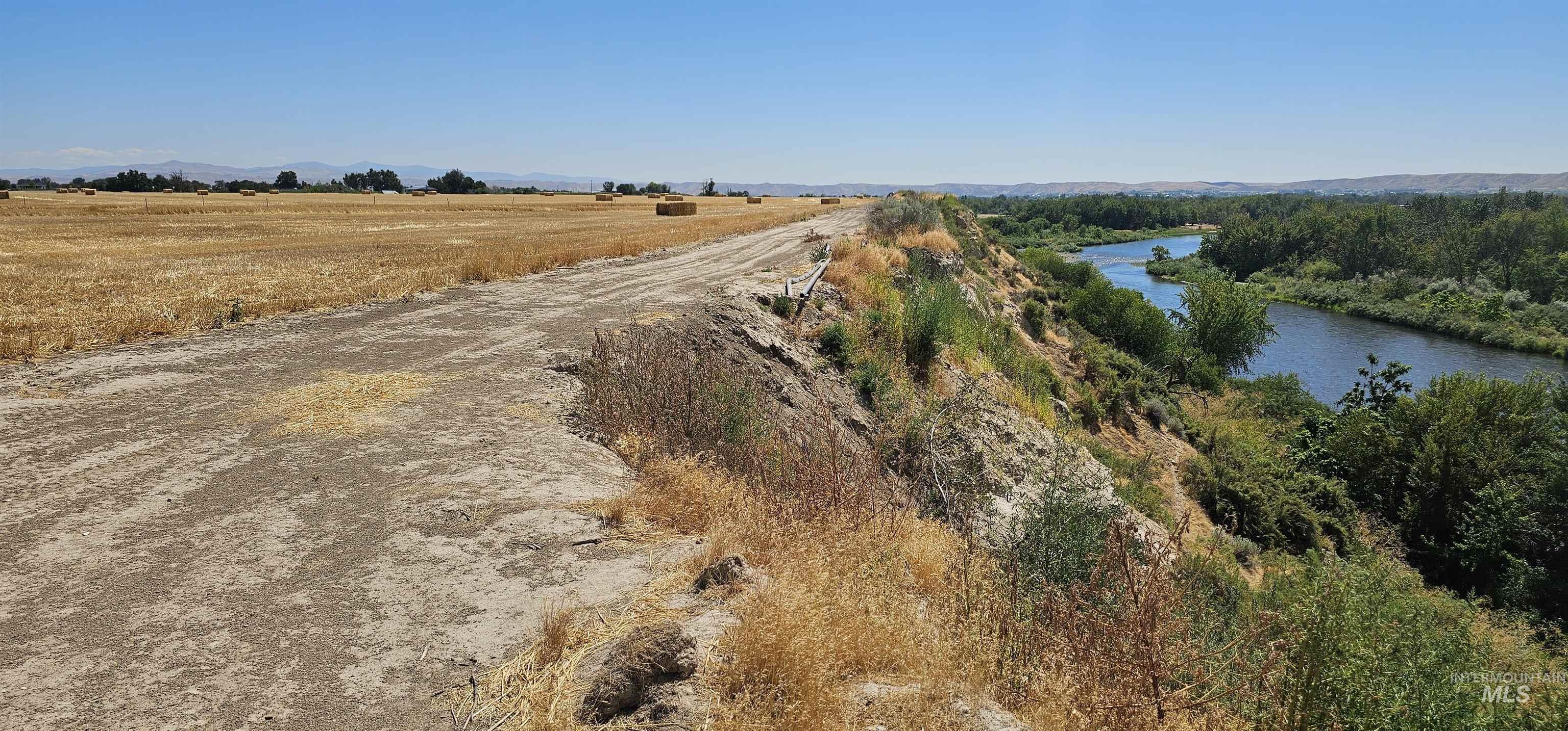 Aerial view of sparsely populated area with a nearby body of water