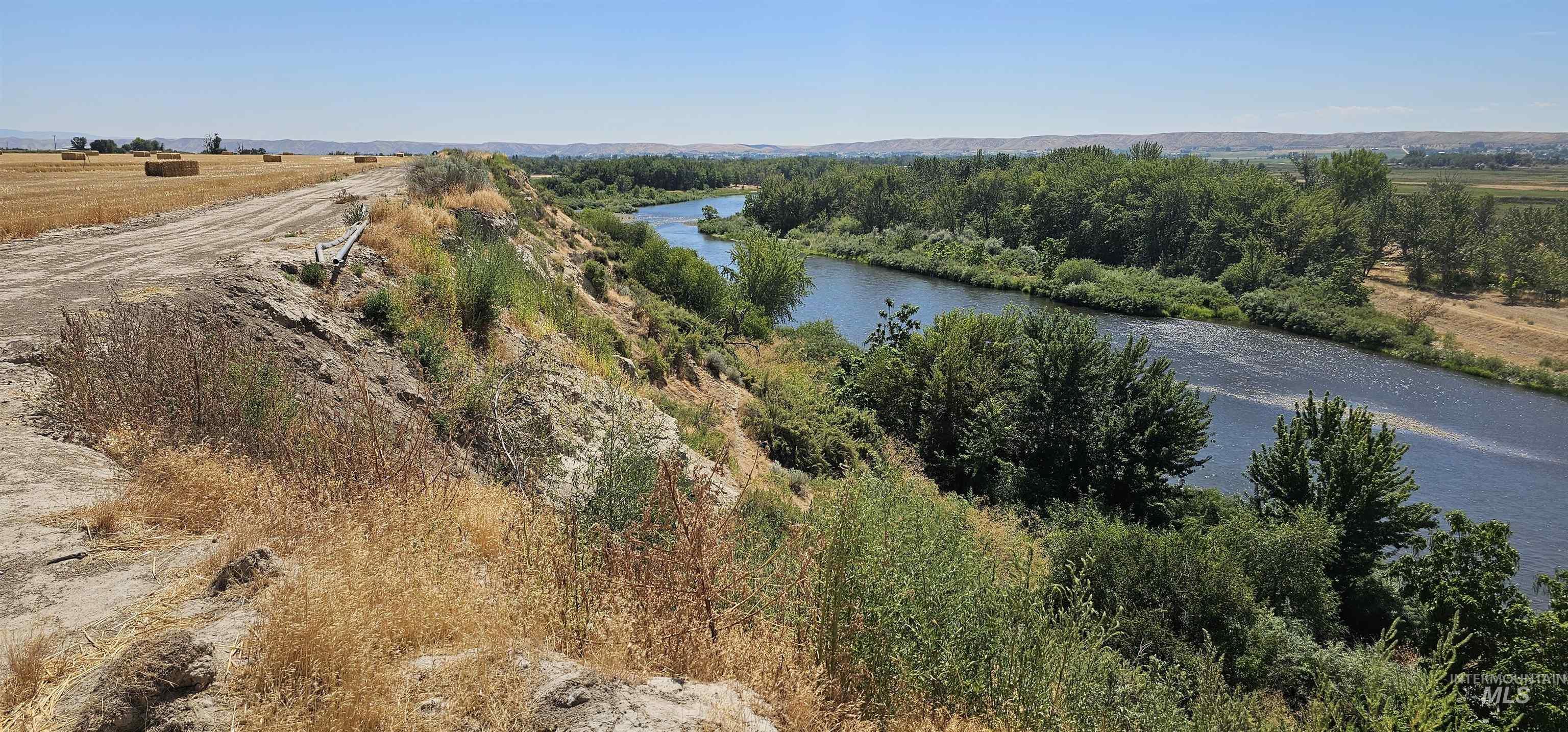 View of rural area featuring a nearby body of water
