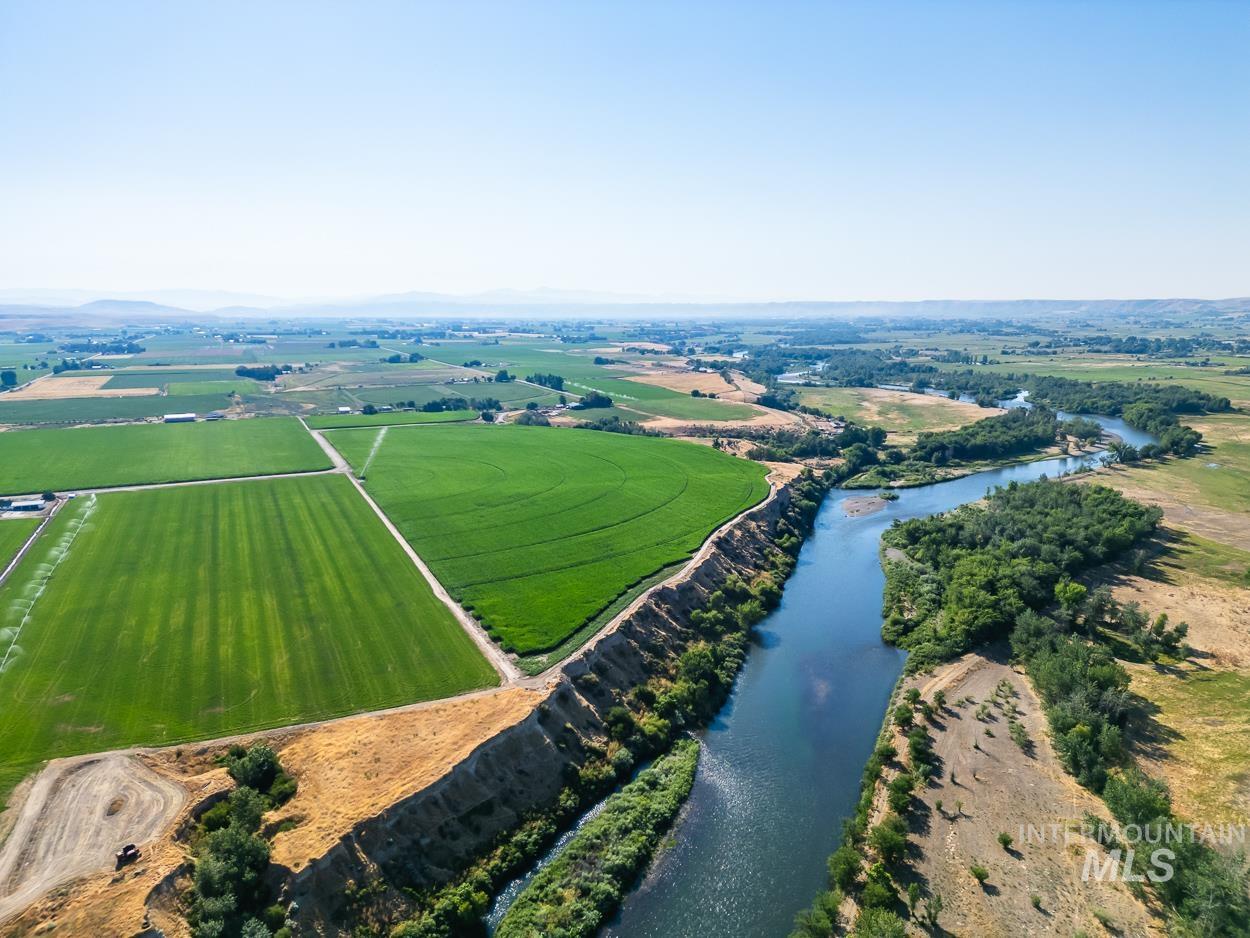 Aerial overview of property's location featuring a large body of water and rural landscape