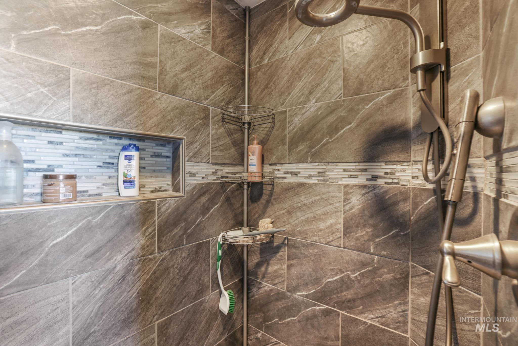 Bathroom view of tiled shower