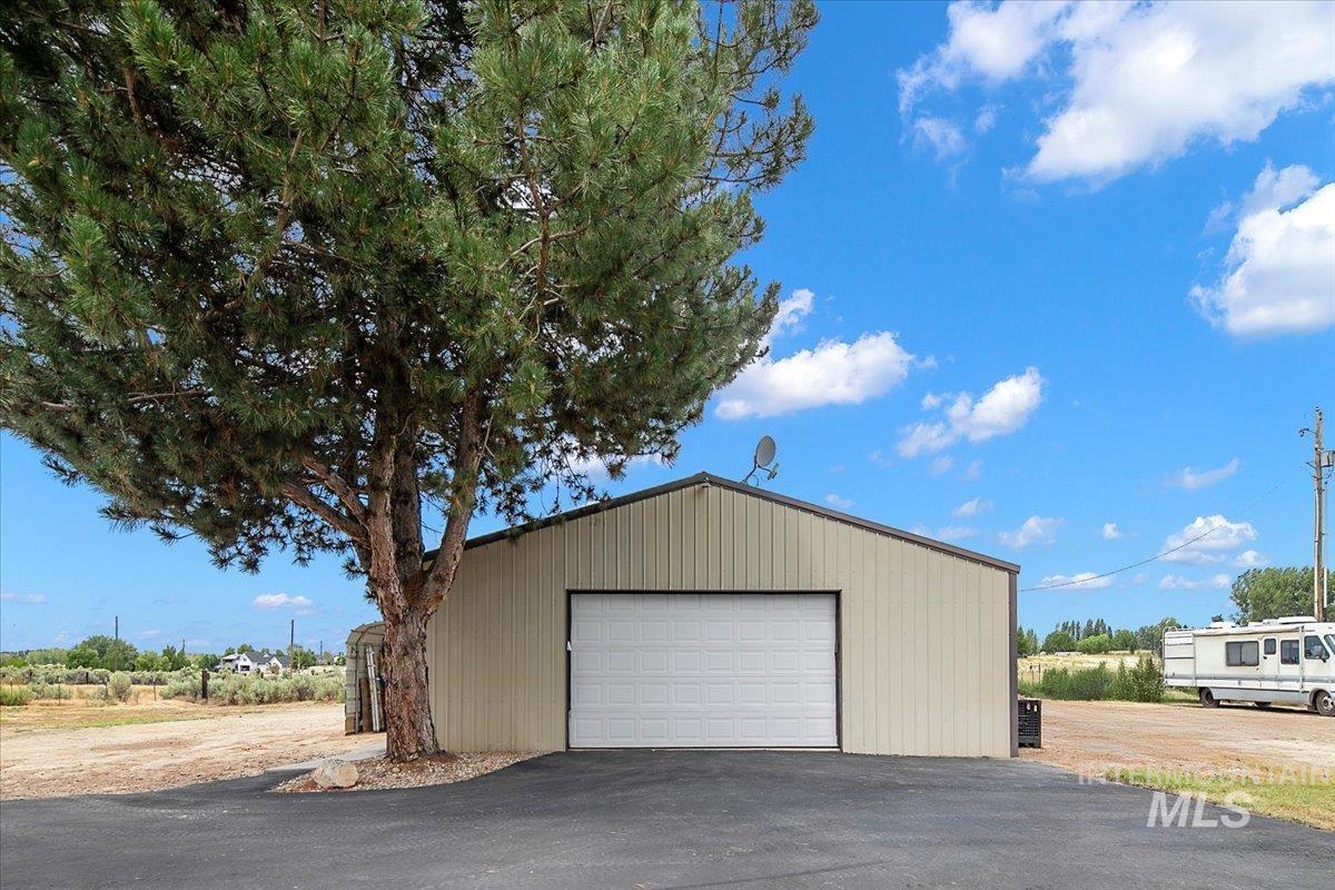View of detached garage/shop.