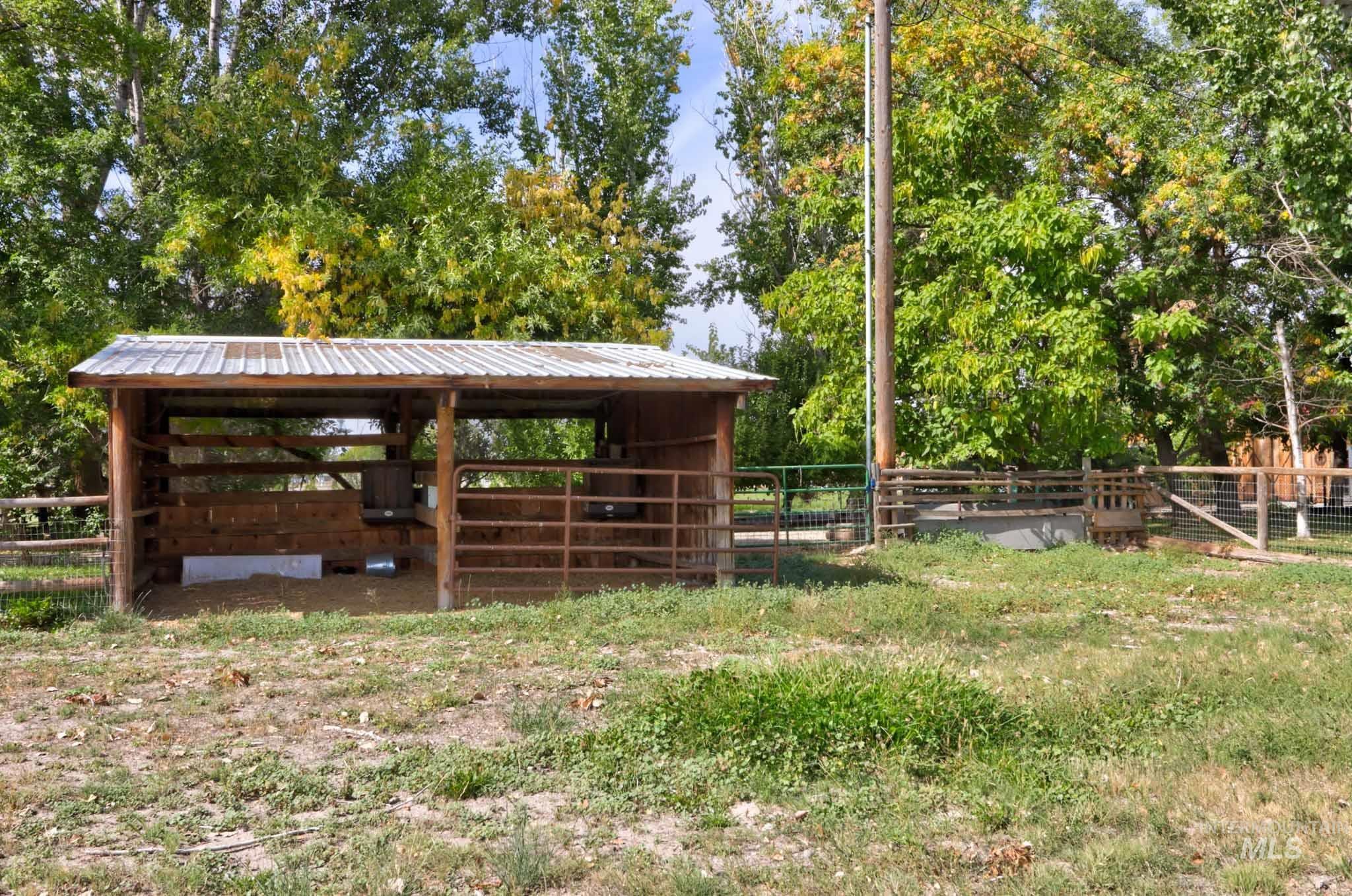 Stable with view of wooded area
