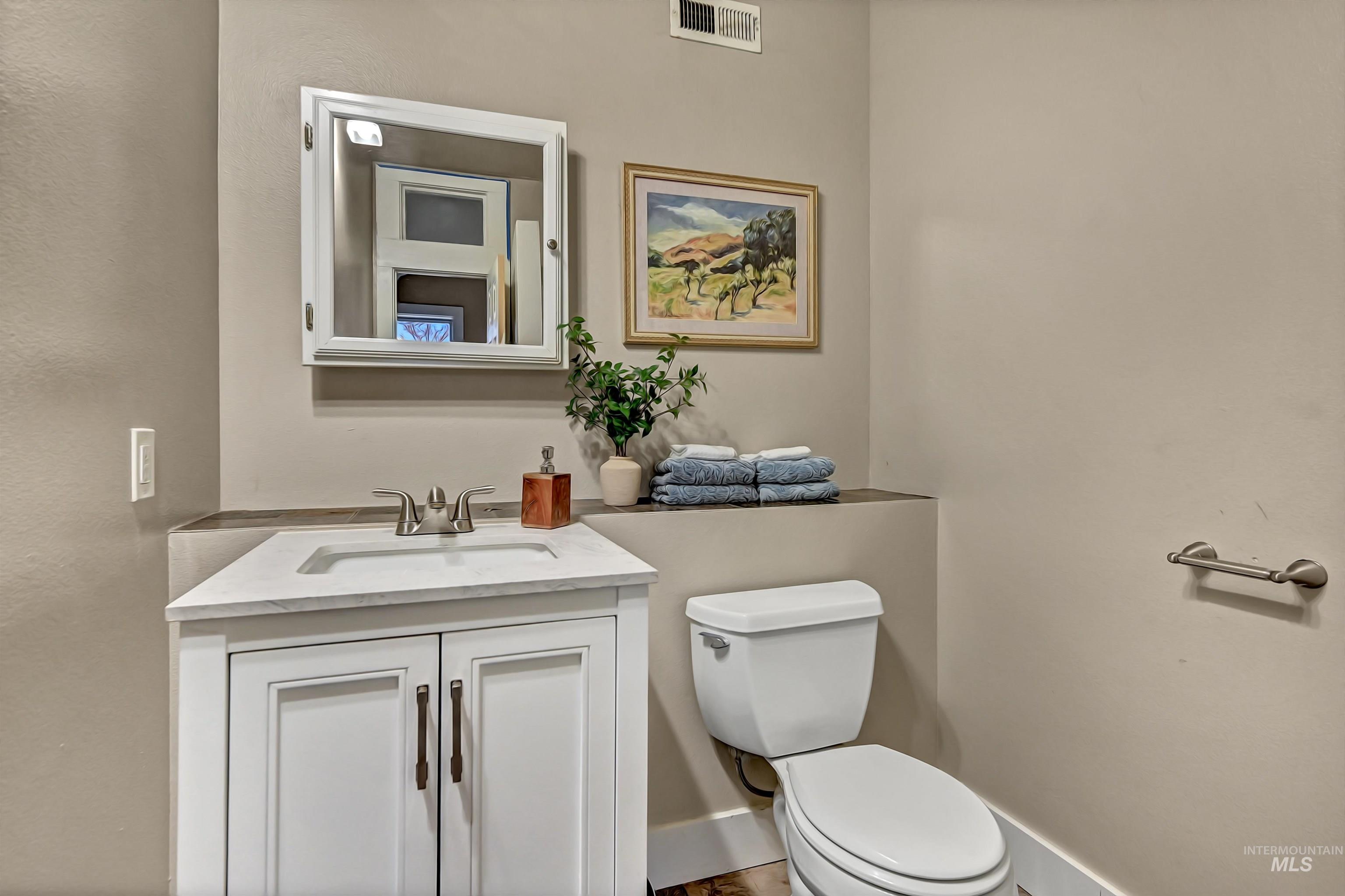 Upstairs bathroom with a walk-in shower.