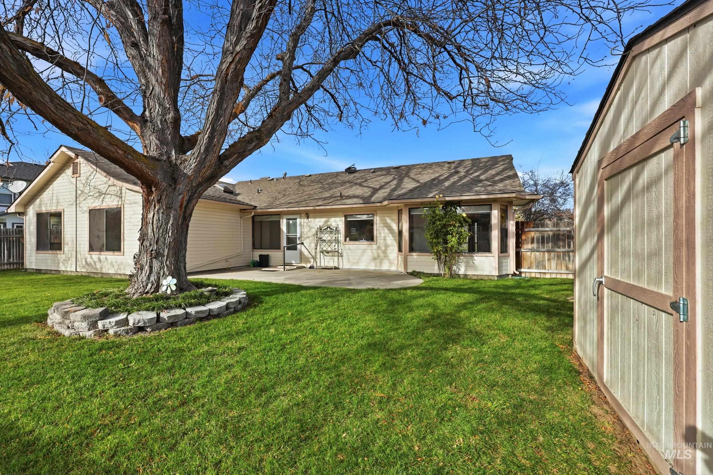 Rear view of property with a patio