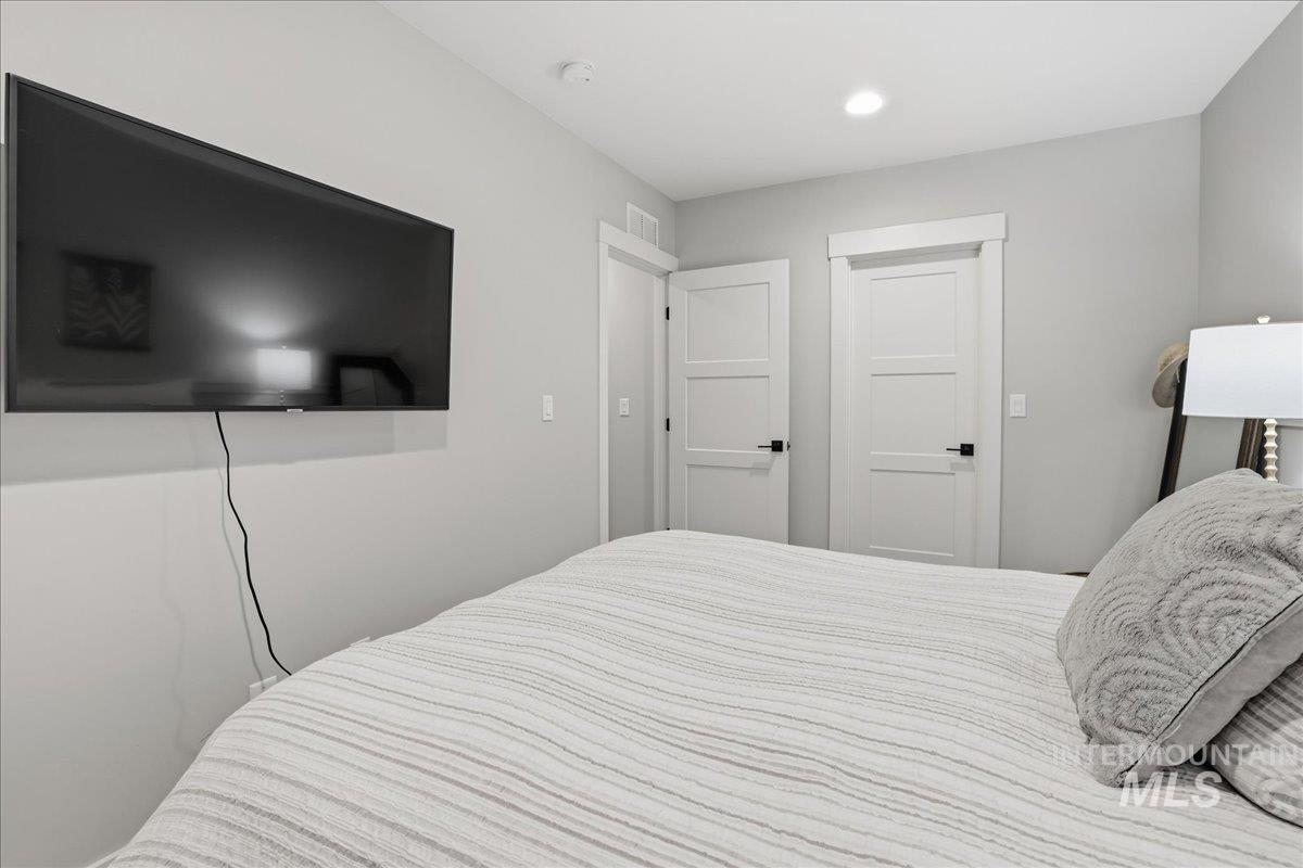 Bedroom with recessed lighting
