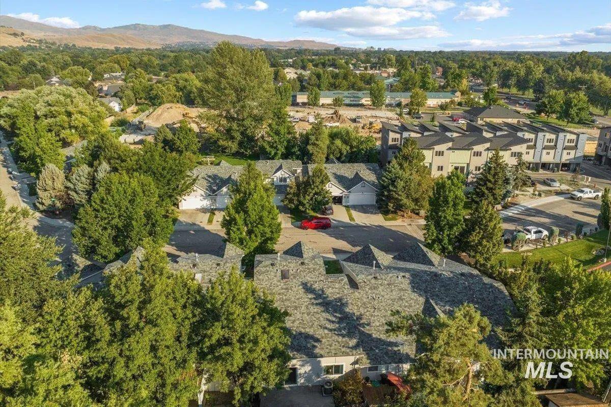 Aerial perspective of suburban area featuring mountains
