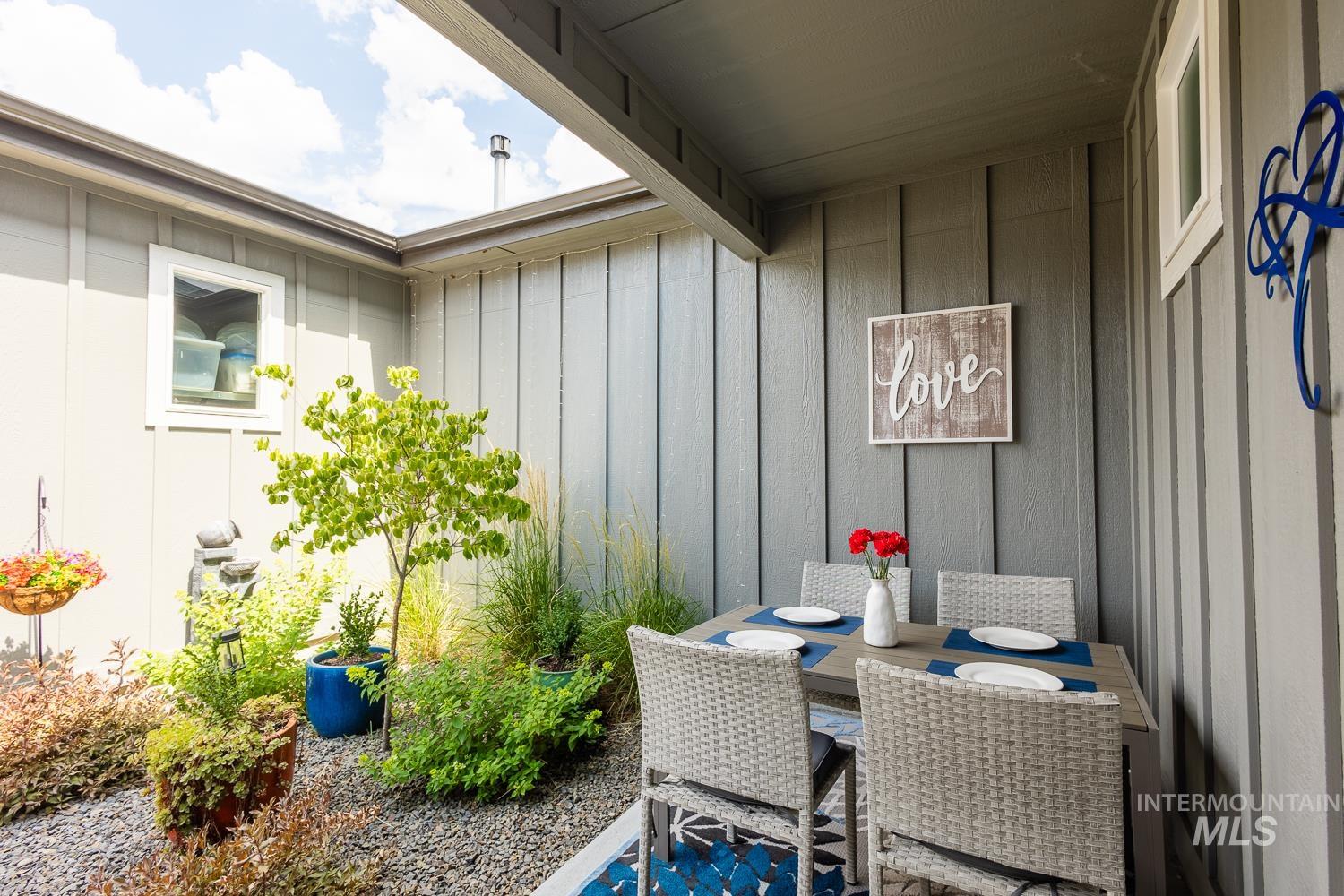 View of patio with outdoor dining space
