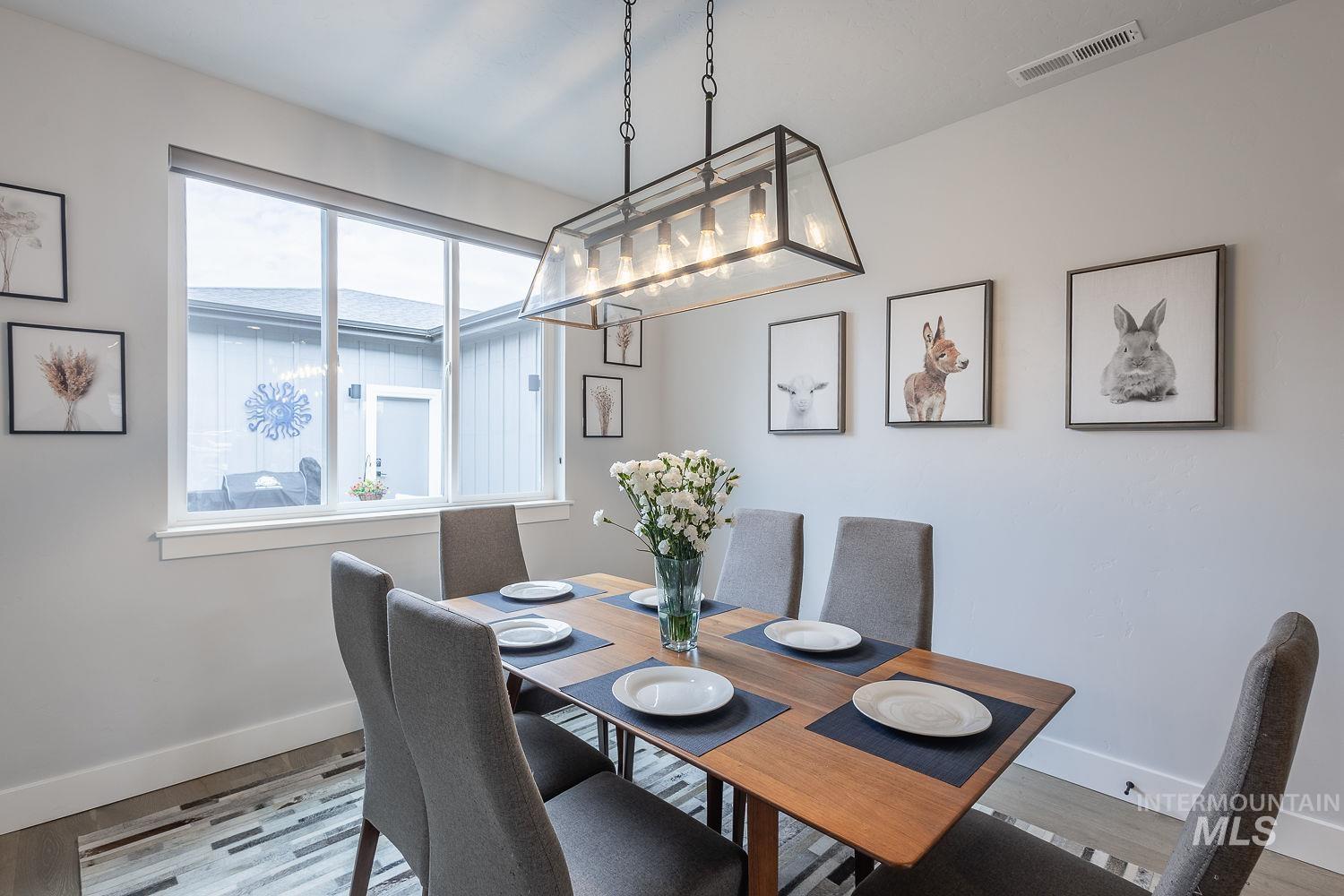 Dining room with wood finished floors