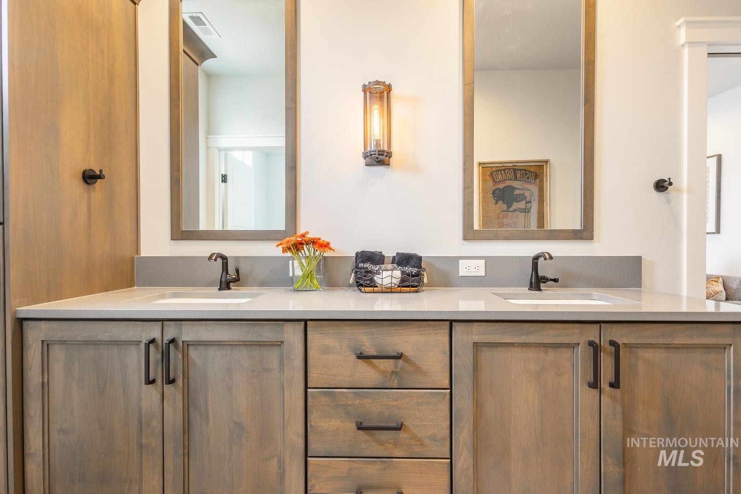 Full bathroom featuring double vanity