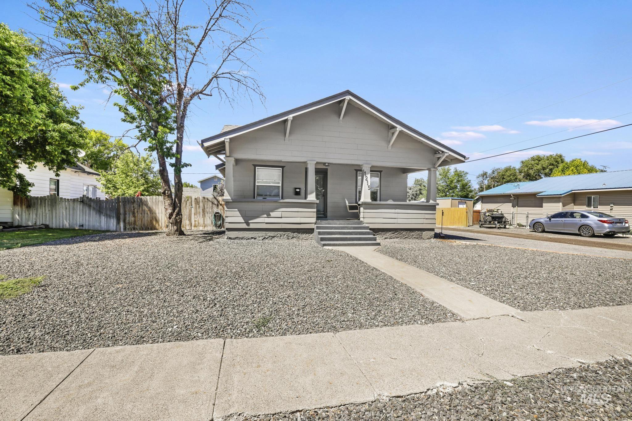 Bungalow featuring covered porch
