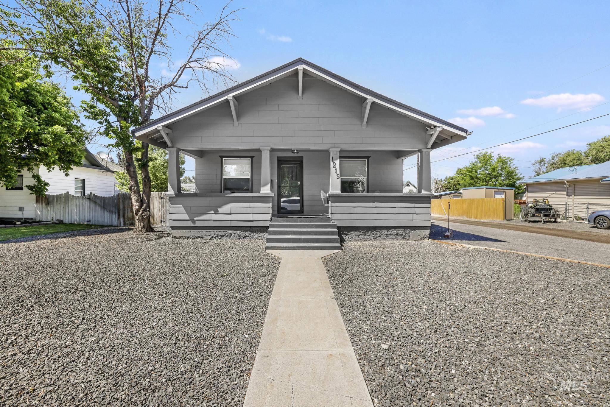 View of front of property featuring covered porch