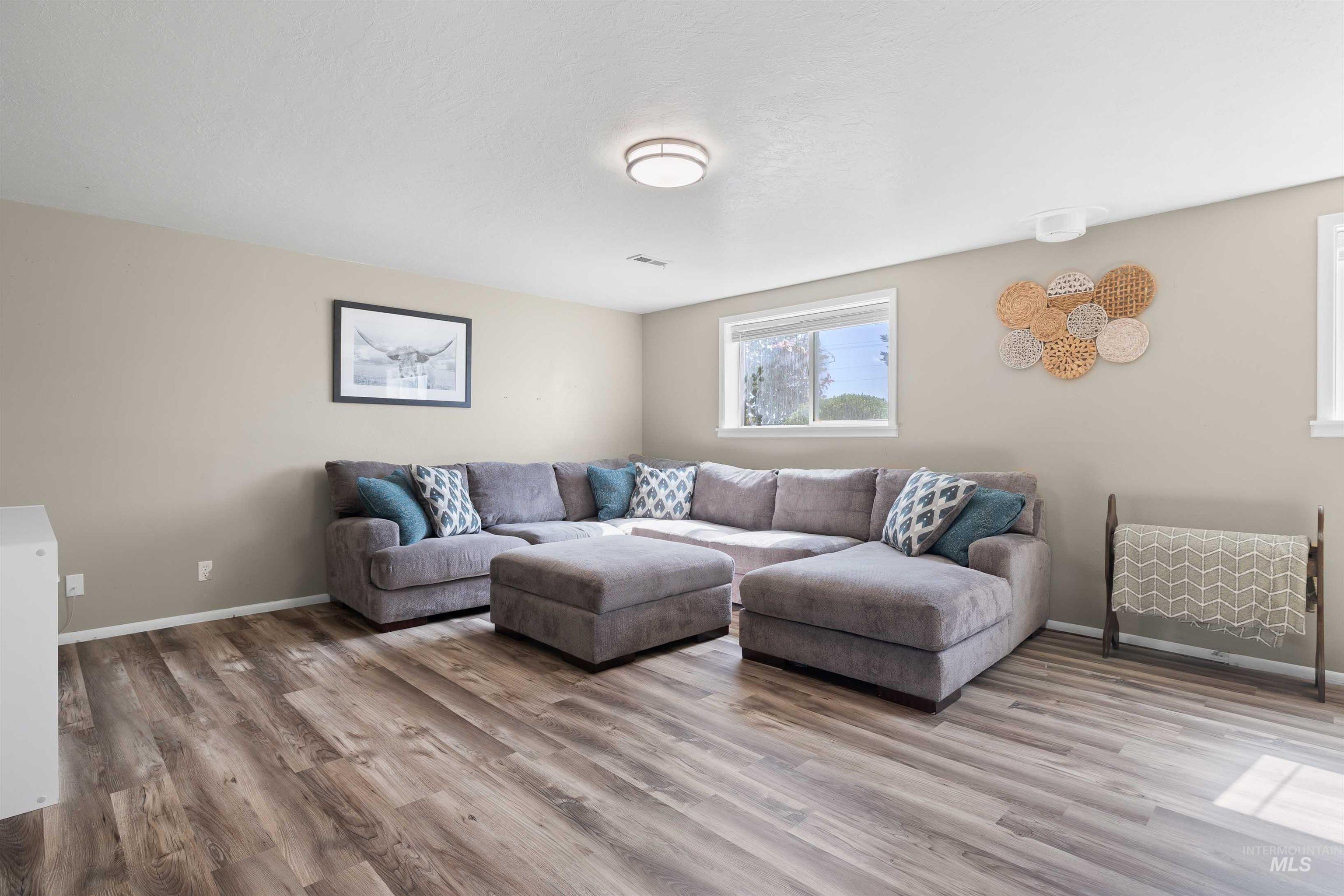 Living area featuring wood finished floors